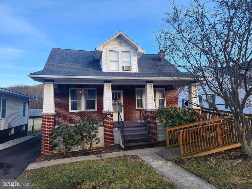 Charming Craftsmen home in the heart of LaVale and Moutain Side Maryland, boasts of 4 bedrooms, 2 full baths, hardwood floors, fireplace, built-ins, front sitting porch, accessable ramp to main level with 2 bedrooms, a full bath and laundry on the main floor, chair lift included for access to other floor, fronts the picturesque lamp-lit LaVale street-scape, level extra lot in the rear. Bring your dreams and make it your own. Be sure to call and schedule a tour!