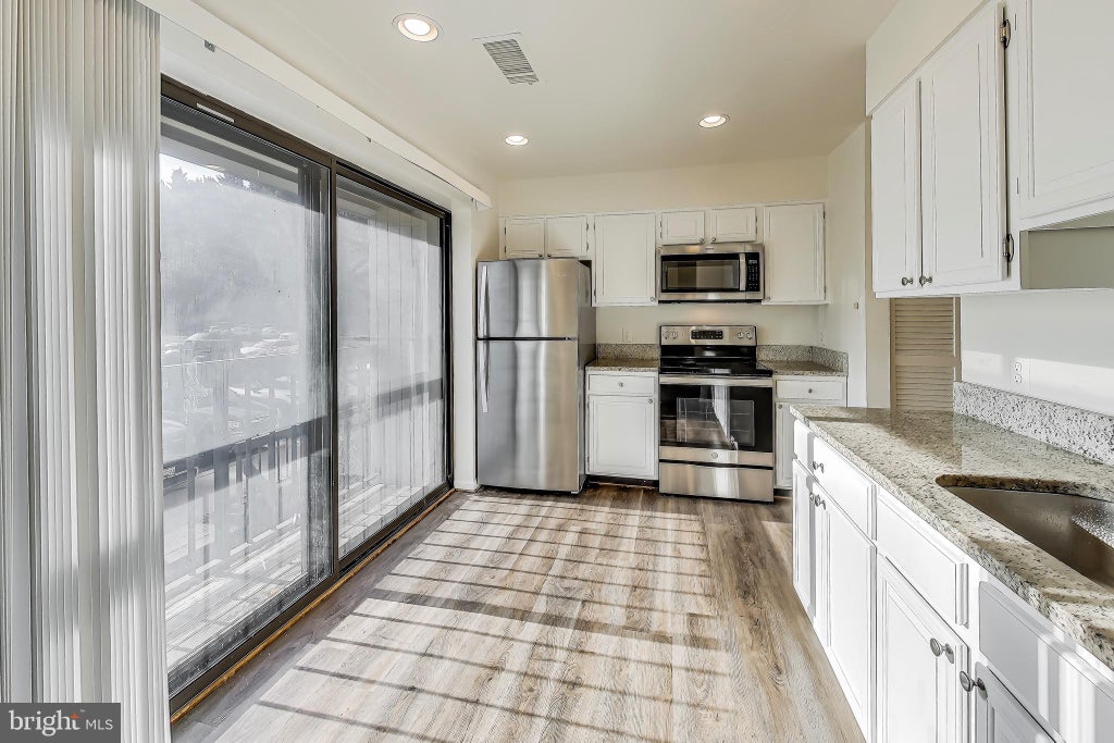 Photo of 16 Dudley Court #7, BETHESDA, MD 20814 (MLS # MDMC2241728)