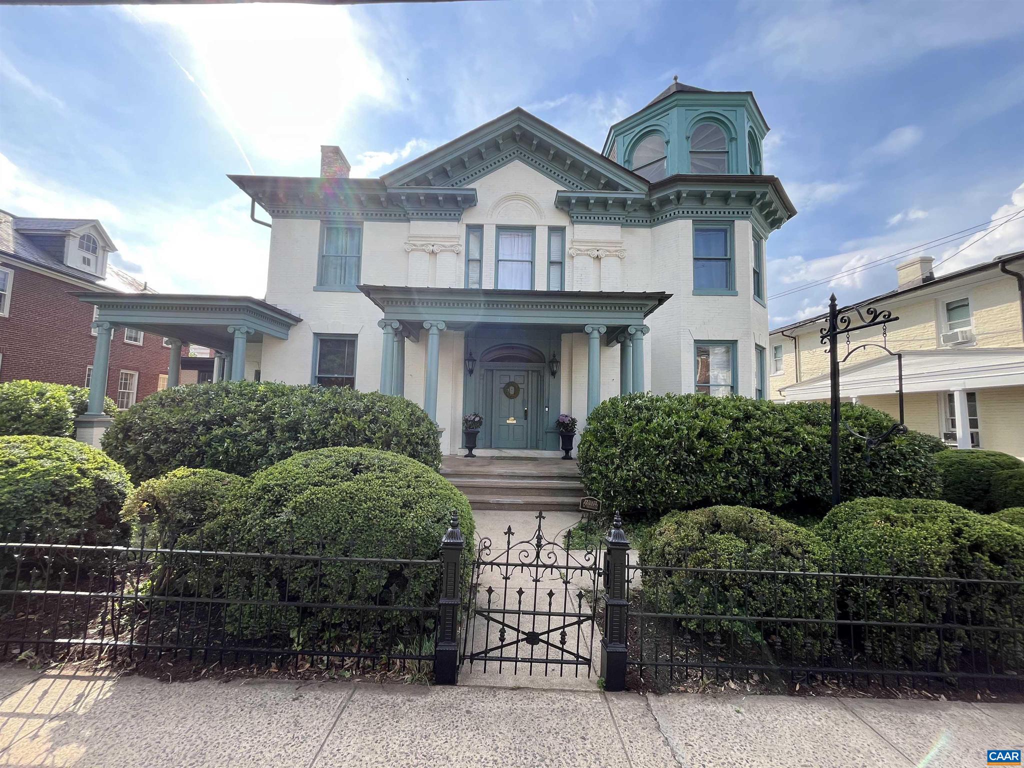 Welcome home to 409 Park Street. Located just two blocks from the Downtown Mall, stroll to Fridays After Five concerts at the Ting Pavilion, shop at local stores, enjoy the culinary delights of Cville's exceptional restaurants, or peruse the weekly farmer's market to create your own in the large open chef's kitchen of this thoughtfully restored gem. Keeping all the charm of this Queen Anne style estate, major renovations were made within the last couple years to restore this building to the grand home it was intended to be. The home features 12 foot ceilings downstairs and 10 foot ceilings upstairs and the renovations include new flooring and fresh paint throughout, an all new kitchen, updated bathrooms, restored windows with new storm windows, a newly installed fence in the front and back, a fresh paved driveway and much more. The exterior provides ample gated parking in the back, a green area with the potential to be made into a beautiful garden, and a blank canvas behind the back porch to create a backyard retreat. While 409 Park St has been restored to a home, possible uses are only limited by your imagination. Current zoning allows for multiple uses including as an office, retail, restaurant/cafe, and as a hotel/inn.,Granite Counter,White Cabinets