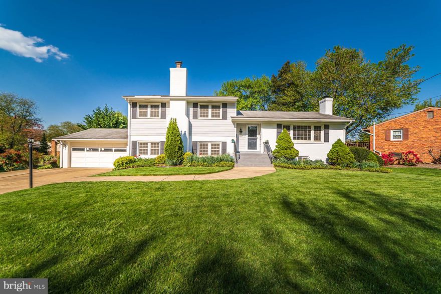 Beautiful 5 Bedroom, 3 Full Bath Home in McLean!  Curb appeal!  Exterior is Brick and Hardiplank Siding.  As you enter you are greeted by hardwood floors on the main and upper levels.  Living room features hardwood floors, large windows and a gas fireplace.  Pass through the French Doors to the large Dining Room.  Updated Kitchen featuring White Cabinets, Granite Countertops, Stainless Steel Appliances, Tile Floor, Recessed Lighting and Ceiling Fan.  Door off the Kitchen our to the 21x16 Deck overlooking large grassy yard.  Head upstairs to 3 generous bedrooms and 2 full baths.  Master Bedroom with wood flooring, ceiling fan and walk-in closet.  Master Bathroom updates include tile shower, tile floor and vanity.  Bedrooms 2 and 3 have wood floors and ceiling fans.  Updated Hall Bathroom with updated vanity, tile shower and tile floor.  Lower level 1 has a Family room with wood burning fireplace and 2 ceiling fans.  Bedroom 4 with 2 closets and a ceiling fan.  Full Bath with updated tile shower, tile floor and updated vanity and toilet.  Lower Level 2 features a Rec Room and Bedroom.  Large Fenced Rear Yard with Large Two Door Storage Shed.  Updated Vinyl Double Pane Windows Throughout home.