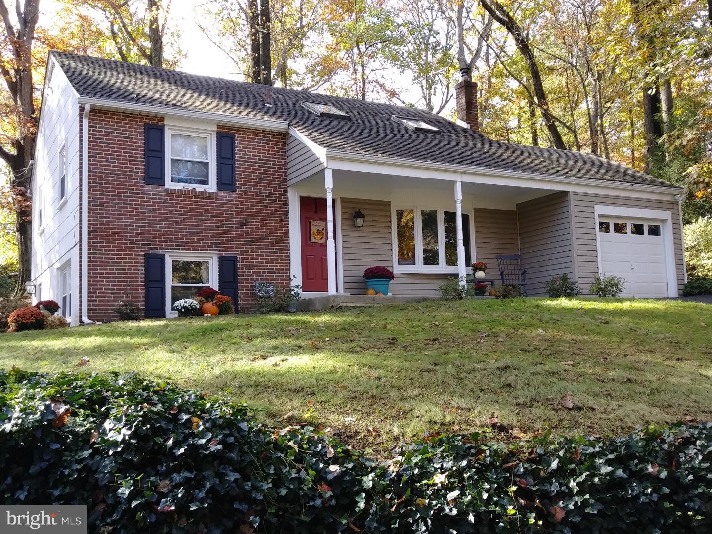 Welcome to 10 Wooded Lane, located on a cul-de-sac street in the award-winning school district of Rose Tree-Media.  This exceptionally beautiful home has been lovingly maintained and renovated over the years.  2008:  New A/C unit; 2011: New? front porch, front bay window, siding, gutter guards, shutters, outdoor lighting, attic fan.  2015:  New 200 amp service installed; 2016:  Brand new kitchen complete with quartz countertops, stainless steel appliances, induction range, and hardwood flooring.  2016: newly painted and hardwood flooring installed on entire lower level.  Gorgeous hardwood flooring t/o entire home along with all new windows.  Enter into the living room and just a few steps down you will find family room, dining room and kitchen on lower level.  Unfinished basement houses washer/dryer and plenty of storage space. Upper level there are 3 bedrooms and 1 full, updated hall bath.  Another few steps up from this level is a master bedroom suite, complete with full, updated bath.  Close to Media-Elwyn train station, Rt. 1, Rt. 476, I-95, downtown Media and Linvilla Orchards.  Must see this beautifully updated home on serene, wooded lot in lovely Middletown Township ? AND!  All with low property taxes!