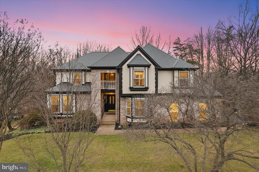 Uniquely elegant and beautifully appointed, this exceptional 4-bedroom, 3 full and 1 half bath residence offers over 4,359 finished square feet of refined living space on a private .57-acre lot backing to serene parkland.

A dramatic granite foyer makes an unforgettable first impression, opening to gracious formal living and dining rooms, a private library, and an inviting family room — all enhanced by rich hardwood flooring throughout the main and upper levels. Expansive bay windows fill the home with natural light while adding timeless architectural character.

Designed for both elevated entertaining and comfortable daily living, the gourmet kitchen features a center island, walk-in pantry, butler’s area, and a striking brick enclave framing the Thermador Professional Series gas range top and double ovens. A Zephyr Professional Series range hood with remote control and enhanced lighting completes this distinctive culinary space.

Upstairs, the luxurious primary suite serves as a true retreat, offering a private sitting room, second study, spa-inspired upgraded bath, and an enormous walk-in closet designed for both comfort and functionality.

The fully finished walk-out lower level adds 1,127 square feet of versatile living space — ideal for recreation, guests, fitness, or multi-generational living.

Outdoor living is equally impressive. A massive 35x16 deck overlooks mature trees and protected parkland, creating an exceptional setting for entertaining or peaceful relaxation. The professionally maintained grounds include an enhanced sprinkler system with added zones and a rain sensor, supporting the home’s lush landscaping and established setting.

Meticulously enhanced and maintained over the past 14 years, this residence reflects a rare level of pride of ownership and long-term investment.

Additional thoughtful upgrades include:
• Three-zoned HVAC
• Renewal by Andersen Windows and a basement French door
• Industrial-grade 6-inch gutters with gutter guard covers
• Private lot backing to protected parkland

The features highlighted above represent only a sampling of the extensive improvements made throughout the home — a comprehensive list of updates is available in the documents section.

Located just minutes from Reston Town Center and the Herndon Metro Station, as well as scenic trails, parks, and premier community amenities, this home offers the perfect blend of space, style, privacy, and convenience.

Don’t miss the opportunity to experience this exceptional property — schedule your private tour today.