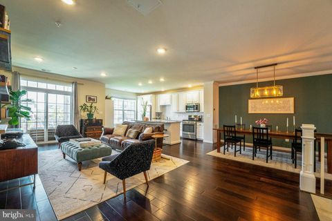 Photo of 23290 Milltown Knoll Square #103, ASHBURN, VA 20148 (MLS # VALO2120036)