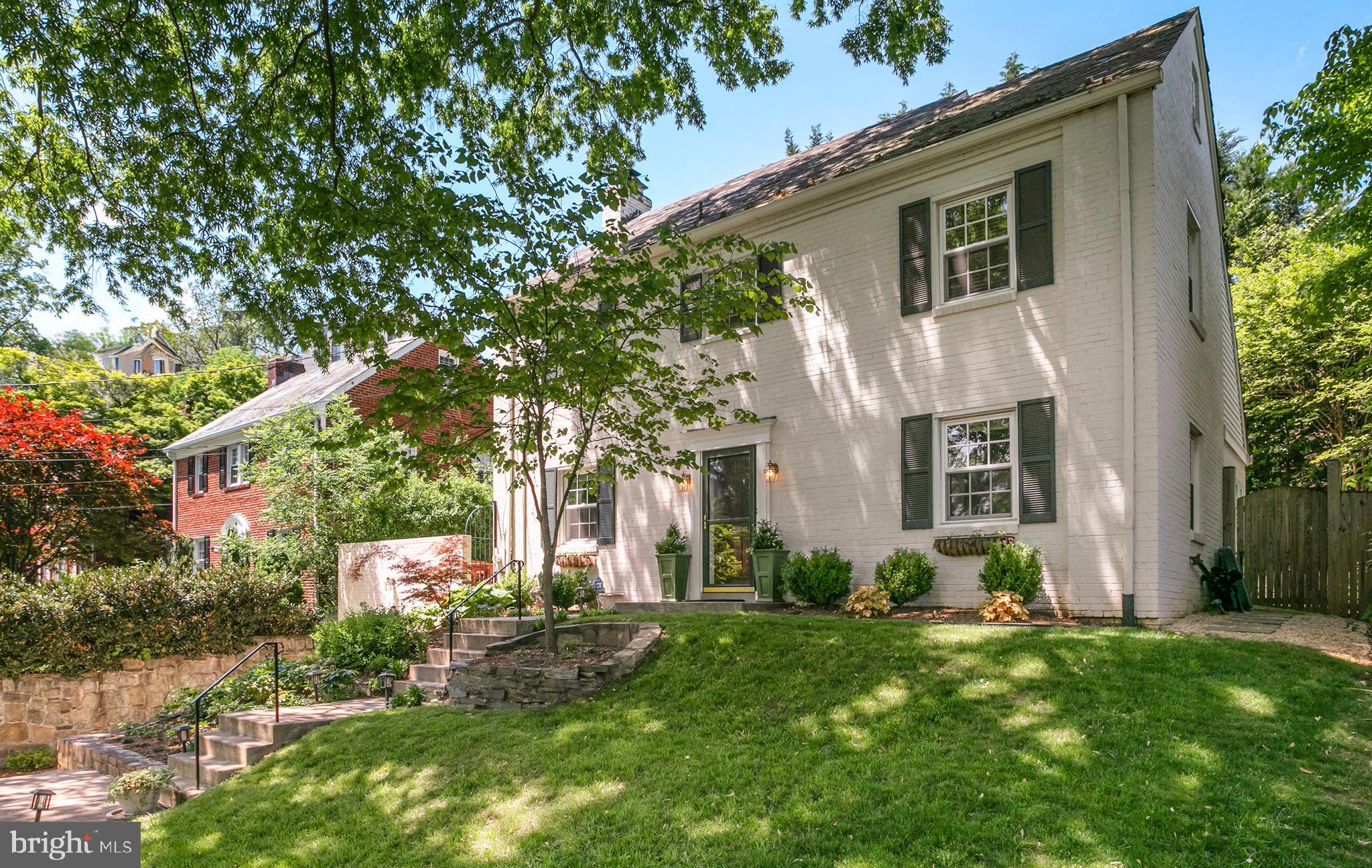 OFFERS, IF ANY, DUE TUESDAY, MAY 14TH AT 3:00PM. Lovely brick colonial in The Town of Chevy Chase near downtown Bethesda. This elegant center hall classic is anchored by original hardwood floors, crown molding, and modern lighting. Balanced by a living room with wood burning fireplace, recessed lighting, and windows on three sides. Enjoy all seasons in the breakfast room/sunroom with walls of windows overlooking the lush backyard. The kitchen features stainless steel appliances, ample cabinetry, and updated countertops. Upstairs, the primary bedroom features an en suite modern bathroom with double vanity and shower. The second and third bedrooms offer a spacious closet for plenty of storage space. The top floor is used as a 4th bedroom and office. The finished basement is the perfect family room with laundry, built-ins, a full bathroom and more storage. Enjoy the outdoors in the wonderful backyard and the newly paved concrete area above the garage is a bonus space for entertaining! Driveway and attached garage parking complete this fabulous offering.