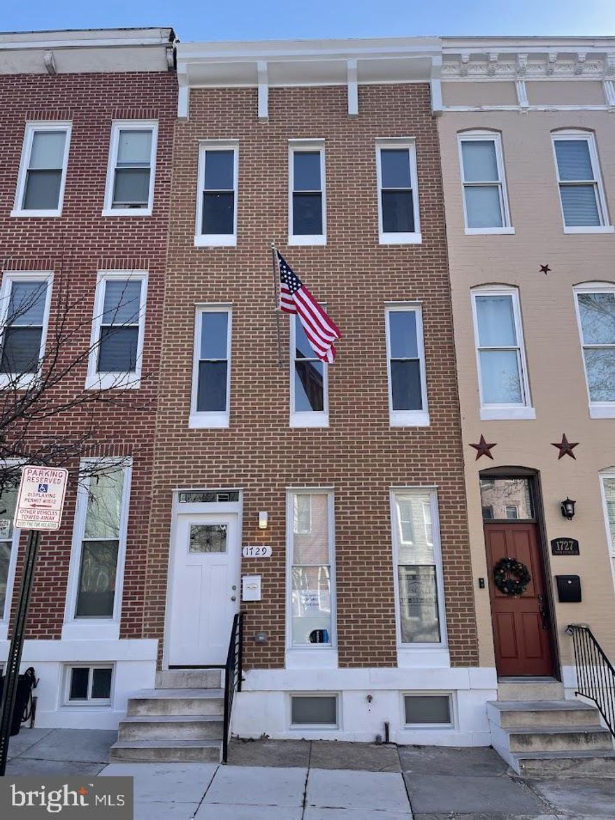 Everything new… Rebuilt/renovated from the ground up.  All new electric (200 Amp), plumbing, HVAC (2 systems), HWH (50 Gal), windows, roof, front brick façade, back brick walls, rear deck, paved and fenced back yard and new floor layouts throughout.   4 BR, 4 ½ Bath 3 above grade levels and a finished basement.  Exquisite open main level with tray ceilings and chair rail molding.  Large kitchen with upscale appliances, counters, backsplash and abundant designer base and 42” wall cabinets adjacent to a separate dining area.  Laundry with stackable washer/dryer at rear of main level along with a half-bath.  Electric fireplace in front living room along with built-in book/display shelves.   2nd floor Master suite with large walk-in closet and attached bath.   2nd floor also includes large front bedroom, a full bath, and an HVAC utility closet a portion of which can be used for storage.   Ceiling fans, recessed lighting throughout home.  3rd floor has 2 bedrooms and a bath.  As your needs dictate the smaller bedroom can be used as a nursery, office space or as a huge walk-in closet/storage or some combo thereof or the whole top floor can be considered another master suite.  Basement has a large front multipurpose room and a center family room, and a large full bathroom with walk in shower.   An enclosed utility area housing the HWH and sump pump can provide additional storage space.  Home is located on a great block with friendly neighbors with a wide Street.  Bus lines (CL- Gold and LL-54) close by.  Home is approximately a mile from the main Hopkins Hospital campus and 2.5 miles from Baltimore City Center (Baltimore St. and Charles St.).   Overall an amazing  upscale urban Townhouse.