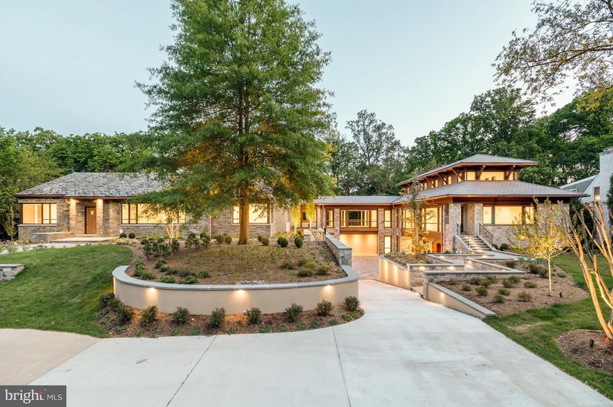 Exceptional opportunity! This is a must see, unique one-of-a-kind custom designed property! Homes with this acreage are rarely available in DC. It is the owner's childhood home that has been expanded with a sleek new wing, blending timeless craftsmanship with stunning contemporary design and high-end finishes and amenities. It encompasses approximately 9,300 square feet of versatile livable space plus a 950 sq. ft. attached 3-car garage. An elevator from the garage leads to the Main Level of the new addition. 

Prominently sited on a combined .83 acre lot in DC's elite Forest Hills, this home features striking walls of glass flooding the spaces with light and providing lovely views of the grounds. Over 4,000 trees and plantings have been added to the landscape. An expansive backyard offers a couple of stone patios and the original Carderock stone Barbecue with wood-fired oven, grill and pizza oven for entertaining and relaxing in a serene, private setting. 

This impressive 6 Bedroom, 5 full and 2 half Bath property has 3 levels. The Main Level of the original stone house celebrates its heritage with meticulously maintained and enhanced architectural features and amenities. It offers ideal circular flow for easy living and entertaining. The Living Room opens to the Great Room with a soaring ceiling and balcony overlook. A wall of glass frames the lush garden beyond, paired with a door to the flagstone terrace. The original Dining Room adjoins a well-appointed Kitchen addition. There is also a Main Level Study and spacious Master Bedroom Suite. Two Bedrooms and a hall Bath are on the Second Floor. An additional above-grade Bedroom and en suite Bath is in the Lower Level. 

A bonus Sitting Room opens to the glass enclosed Breezeway connecting the 2 wings. The new wing showcases exceptional design and modern craftsmanship. There is a large Sunroom with adjoining space plumbed for a wet bar, a sumptuous Master Bedroom Suite, an expansive top floor Gallery retreat, a second Bedroom and en suite Bath, Laundry, Elevator, and a heated 3-car Garage opening to a paved motor court with additional parking.

This unique home has been meticulously cared for and thoughtfully expanded. Flexible multi­use spaces allow one to adjust for personal needs. This unparalleled property presents a rare opportunity in our marketplace.