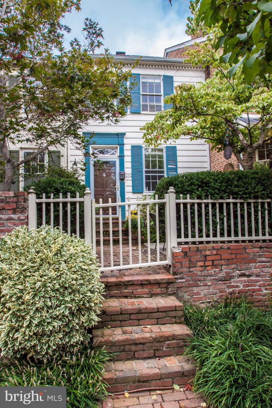 Charming historic townhome, circa 1880, with original pine floors, wood-burning fireplace & lovely deep garden.  Kitchen was totally renovated in 2015.  New CAC, furnace, hotwater & washer/dryer in 2018.  Only one half block to Lyles Crouch & Balducci's.  Loads of charm & character!