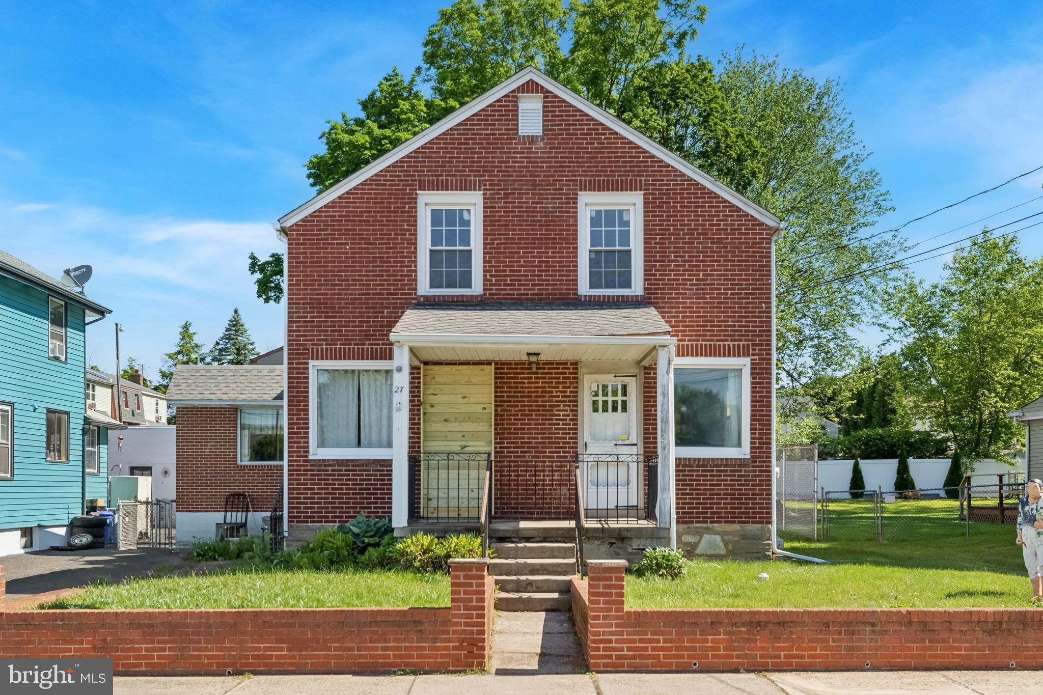 Welcome to this charming detached brick home, a unique home that has been skillfully transformed, with the first floor previously housing a business that has been converted into a multifunctional den. Enter through the covered front porch into a well-lit den illuminated by a large window that fills the room with lots of natural light and a ceiling fan for year round comfort. Continue into a bright living room, featuring carpet and a ceiling fan, or down a short hallway to the dining room adorned with beautiful hardwood floors and a distinctive wood beam doorway. The kitchen is a cook's delight, boasting new cabinets and flooring, upgraded countertops, and the convenience of gas cooking. The main floor also includes a practical laundry area and a convenient half bathroom. Upstairs, you'll find three generously sized bedrooms, each with cozy carpeting and ceiling fans, along with a full bathroom complete with a tub shower. Completing the interior of this home is an unfinished basement equipped with a beautiful cedar closet for storage. The fenced-in backyard is a private oasis, featuring a new deck and pergola, ideal for outdoor gatherings. Additionally, there's a shed with 60 amp power, perfect for storage or a workshop. Driveway parking adds to the convenience of this home. This property has seen numerous updates, including newer windows throughout, a newer water main and sewer, upgraded 200 amp electric, a high-efficiency gas heater, and a new water heater. Located close to downtown and the train station, this home offers easy access to shopping, dining, and commuting options. Combining modern upgrades with classic charm, this is the perfect place to call home. Schedule a tour today and make this house your home!