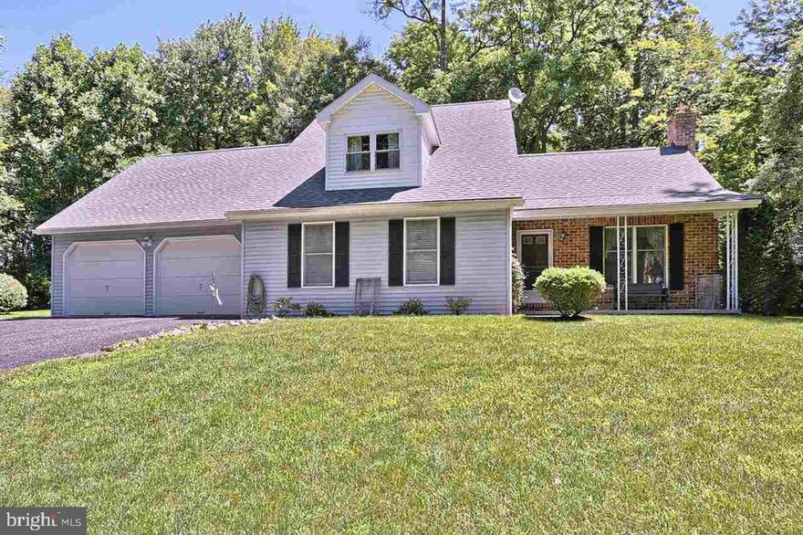 Beautiful home in a private setting! Features include a 1st floor master bedroom w/ full bath & two closets. Other features include a vaulted ceiling in the living room, open floor plan, and a large shed for storage! The Den on first floor is currently being used as an office. The upstairs has 2 bedrooms, a bonus room, 1 full bath, additional areas for storage. There is a 2 car garage with interior access to plenty of storage above.