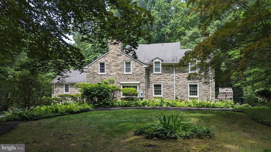 One of the most splendid homes on the Main Line is now on the market.  Built in 1938, 304 Keithwood Rd. is a cul-de-sac street in Northside Wynnewood, and has gone through extensive renovations and upgrades over the past 12 years, all the while maintaining so much of its priceless, original character.  This stone home sits on almost an acre of land (.90) with a magnificent, terraced backyard encompassing two patios, a heated swim spa, and a level turf yard for the kids, dogs, or golfer who wants their own putting green, much of which was designed by the landscape artists at Gasper.  The craftsmanship is sublime throughout, perhaps most particularly in the unbelievably grand, true Chef’s Kitchen.  With a commercial-grade refrigerator and freezer, Viking appliances, including two dishwashers, double-door oven, warming/proofing drawer, a separate gas range, and multiple sinks, it also has the most remarkable private view across the back through an arched window.  Enter the home through the stone portico into a spacious foyer.  Follow the original hardwood floors into either the colorful private office with one of the four fireplaces in the home, or the Living Room where you’ll see another fireplace and access to one of the patios. The Dining Room and Den are next, both adjacent to the beautiful Eat-in Kitchen which you simply have to see to believe!  Don’t miss the first-floor in-law suite with bedroom, full bath and kitchenette.   A lovely Powder Room finishes off the first floor.  Make your way upstairs to three bedrooms, including the primary suite with its massive walk-in closet (once a bedroom) and ensuite bath.  Both of the other bedrooms have their own full bathrooms, and one of the bedrooms has a built-in Murphy bed.  A possible 5th bedroom is on the lower level of the home.  The lower level adds another 689 finished square feet to enjoy, and is beautifully finished with epoxy resin floors, yet another fireplace, a full bath, laundry, and access to the second garage and the garden room.     Set in a secluded location, the house is within walking distance of various houses of worship, just minutes from schools, the train, great shopping, and restaurants.  This is a very special home that's a true retreat and well worth a visit.