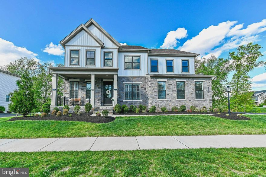 Welcome to this stunning Toll Brothers Richardson model, offering over 6,800 square feet of thoughtfully designed living space in the heart of Aldie in the sought after Lenah Mill Community. Perfectly situated on a premium end-row lot backing to mature trees, this home combines luxury finishes, privacy, and exceptional versatility for today’s lifestyle.

Originally built with over $100,000 in builder upgrades, this home showcases high-end design throughout, including wide-plank engineered hardwood flooring, designer tile selections, and a beautifully curated chandelier that adds an elegant focal point. The gourmet kitchen features quartz countertops with a waterfall edge, a full-height backsplash, and a complete suite of KitchenAid stainless steel appliances.

Designed with flexibility in mind, the home offers two additional bedrooms and two dedicated office spaces, along with a multi-generational primary bedroom on the main level, making it ideal for extended family, guests, or private workspace needs. Custom built-in closets provide both style and functionality, while a mudroom adds everyday convenience.

The open-concept main level is complemented by fresh interior paint, creating a bright, modern feel throughout. Each bedroom is equipped with its own ceiling fan for added comfort. Step outside to enjoy the newly built deck overlooking a peaceful, tree lined backdrop, perfect for entertaining or relaxing.

This home is also equipped with a variety of smart home and security features, including a wireless garage door opener, Ring doorbell, and a 360-degree security camera system, offering both convenience and peace of mind.

Additional highlights include:

Recently serviced HVAC system (2026), 
Two-year supply of high-quality HVAC filters, 
Spacious lot with enhanced privacy and curb appeal, 
Move-in ready condition with thoughtful upgrades throughout. 

Located with convenient access to major commuter routes, shopping, dining, and top-rated schools, this home presents a rare opportunity to own a truly upgraded and versatile property in a prime location.