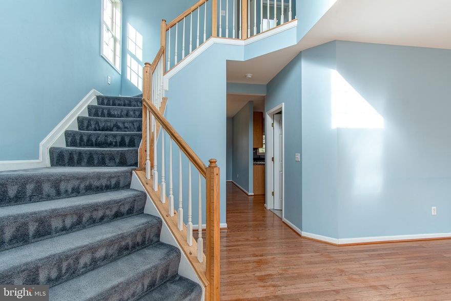 Move-In Ready Kensington Model in Mulberry Station. Welcome home to this spacious 4 bedroom, 2.5 bath residence offering over 2,300 sq. ft. of beautifully designed living space in the sought-after Mulberry Station community. Perfectly positioned on a large lot that backs to open farmland, this property combines modern upgrades with timeless charm. Key Features & Upgrades: 9’ ceilings on the main level with hardwood foyer and elegant 2-story design. Chef’s kitchen with Merillat cabinetry, granite counters, and full suite of appliances (including microwave) Family room with natural gas fireplace—a cozy centerpiece for gatherings. Vaulted primary suite with cathedral ceiling, bay window, and a luxurious super bath featuring whirlpool tub. Dual-zone HVAC for year-round comfort. Andersen windows, insulated doors, and brick skirt detail for lasting quality. Landscaping, concrete driveway, and sodded front & sides for instant curb appeal. 2-car attached garage with 220V line. Lifestyle Benefits: Bright breakfast area plus formal dining room for entertaining. Hardwood floors throughout the main level for a refined touch. Large lot with space for outdoor living, gardening, or future pool installation. Convenient location—close to town amenities and just minutes to Rt. 50 for an easy commute. This home is move-in ready, priced to sell, and designed for comfort and style. With its thoughtful upgrades, spacious layout, and prime Easton location, it’s the perfect blend of elegance and everyday convenience. This home is currently being painted, professionally cleaned and carpets professionally steam cleaned!