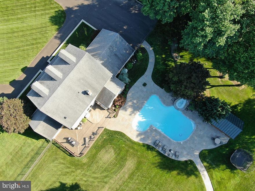 Tucked away from the fast Paced Life and situated on one of the finest (peace ) of real estate in Montgomery County sits this 4,632 SF extraordinarily built home featuring 5 Bedrooms, and 5.5 Baths.  Built in 1985 with craftsmanship & pride, this home features a large Eat-In Kitchen with 42" Cherry Cabinetry, Granite Counter tops & Ceramic Tile Backslash, Hardwood Floors, and a Work Station with a 10x5 Pantry adjacent to the Dining Room with a large Bay Window.  To the right is the 22x16 Family Room with Stone Front Fireplace.  Adjacent to the Kitchen is an IPE Deck with Gas Cooking Grill that is spacious for a feast.  In ground Heated Pool with Spa & Cabana with Bath.  Outside has  2,800 SF Barn/Quarters with Post & Beam of fir wood, white pine interior, stone fireplace, and finished cement floor.  Oh did I say it also has a Living Quarters of @800 SF?  Two car garage w/entry into the Basement 
which is divided up like an Excel Spreadsheet, Utility Closet/Laundry Area /Master Bathroom with Shower/Spa Tub, Rec Room & added sleeping area.  The living room looks into a Circular Drive as you await your guests.  An adjacent room is a Study/Office.  Upstairs can accommodate an army.  The home is super clean/meticulously maintained since inception.  Home features a Generac Generator for protected safety.  Let's go outside again as I forgot to tell you about the Tractor & Work Barn.  If you are looking for the perfect place this is a masterpiece - 4 Star is the critic's Review on this Diamond!
* BUYERS FINANCING NOT PROCURRED-BACK ON MARKET !