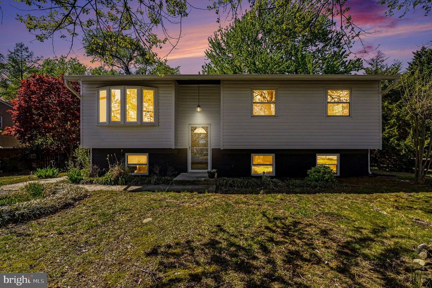 Nestled in the prestigious Riva Farms community, this exquisite 4 bedroom, 3 full bathroom, split foyer home offers a harmonious blend of modern luxury and timeless charm. With a major renovation set completion in January of 2026, this home is poised to elevate your lifestyle to new heights, ensuring every detail reflects sophistication and comfort. Step inside to discover an inviting interior that boasts a thoughtfully designed floor plan, seamlessly connecting the living, dining, and kitchen areas. The spacious combination kitchen and dining area is perfect for entertaining, featuring upgraded countertops and a central island that invites culinary creativity. Stainless steel appliances, including a built-in microwave, dishwasher, and electric range, enhance the kitchen's functionality while adding a sleek, contemporary touch. Natural light floods the living spaces, accentuated by recessed lighting and ceiling fans that create an airy ambiance. Cozy up by the wood-burning fireplace, a perfect centerpiece for gatherings or quiet evenings at home. The fully finished daylight basement offers additional living space, complete with windows that bring the outdoors in, making it an ideal retreat for relaxation or recreation. The exterior of the property is equally captivating, set on a generous 0.36-acre lot that features a level front yard and a partly wooded rear yard, providing a serene backdrop for outdoor activities. Enjoy the tranquility of nature with views of lush trees and manicured gardens, creating a peaceful oasis right at your doorstep. The exterior lighting enhances the home's curb appeal, ensuring it shines brightly both day and night. Safety and convenience are paramount, with security features including smoke detectors and a main entrance lock. The property offers ample parking with a driveway accommodating up to two vehicles, along with additional off-street parking options. Experience the exclusive lifestyle that Riva Farms has to offer, where luxury meets nature in perfect harmony. This home is not just a residence; it's a sanctuary designed for those who appreciate the finer things in life. Don't miss the opportunity to make this exceptional property your own and enjoy a life of elegance and comfort.