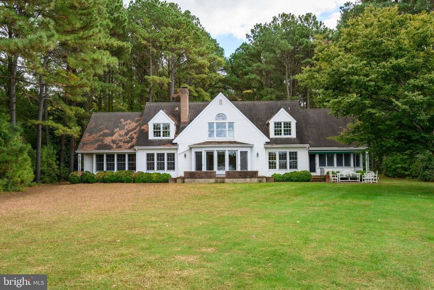 "Whispering Pines" A beautiful waterfront escape on private 2.75 +/- acre lot located within walking and biking distance from historic downtown St Michaels. Spacious, light and airy 4000+ sq foot 3BR 3BA home, custom built in 1996 boasts a desirable large, entry-level, primary suite, 2 en-suite bathrooms upstairs, spacious family room with cathedral ceiling and cozy wood burning fireplace, open kitchen, den with beautiful built-ins, bonus room/4th bedroom above attached 2 car garage,  and a terrific sun room.  Shed with electric, outdoor lighting - including at driveway entrance. 260' +/- of protected shoreline with high elevation, 6-foot-wide pier with electric and water,  3+/-feet MLW , room for a pool. Backyard patio to enjoy amazing sunsets over Broad and Rolles Creek.  Sewer line installation along primary road currently underway.  Property sold as-is,  inspections for informational purposes only.