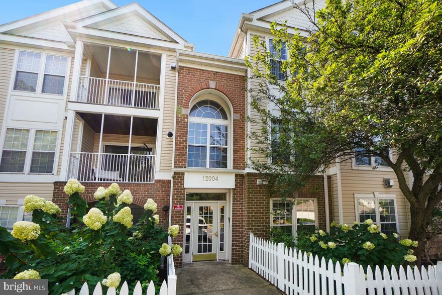 This is one of the most beautiful units you have seen.  Newer paint.  Moldings throughout.  Remodeled kitchen with custom counters and stainless steel appliances plus a tile backsplash.  Laminate flooring throughout.  Nice size primary bedroom with own bath that is remodeled.  Secondary bath also remodeled.  Family room off the kitchen with a gas fireplace.  This is a main level unit located toward the back of the building so it is easily accessible.   Also comes with a garage that is separately deeded.  You also get 1 additional visitor tag for parking.  Amazing commuter location  that is close to Route 355 and Route 270.  Also, a walk to Milestone Shopping Center which includes a Walmart, a slew of restaurants, banking and so close to a Wegmans!  Really cannot beat this...