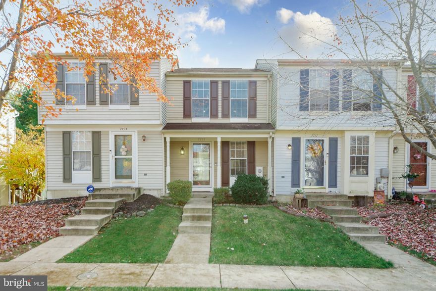 Don't miss out on this updated townhome in a quiet Windsor Mill community right near the beautiful Patapsco State Park, and conveniently close to many shops and restaurants! Park your car in the assigned parking space, and walk up to the quaint front porch as you enter this beautiful home. The front door opens to an open living room that boasts laminate flooring and a two-seat breakfast bar. The living room is open to an updated kitchen with quartz countertops, ample cabinet space,  stainless steel appliances, and space for a kitchen table! The kitchen sliding glass door leads to a large outdoor deck space that backs to woods and a stream that flows from Patapsco State Park. Upstairs, there are two bedrooms with laminate hardwood floors that share a full bathroom in the hallway. The primary bedroom has two large closets, a private vanity area with a sink, and a door that connects to the upstairs full bathroom. Downstairs, you walk into a spacious family room with a impeccably maintained wood fire place, ample storage space, a laundry room, and an updated half bathroom. Come check it out as this home won't last long!