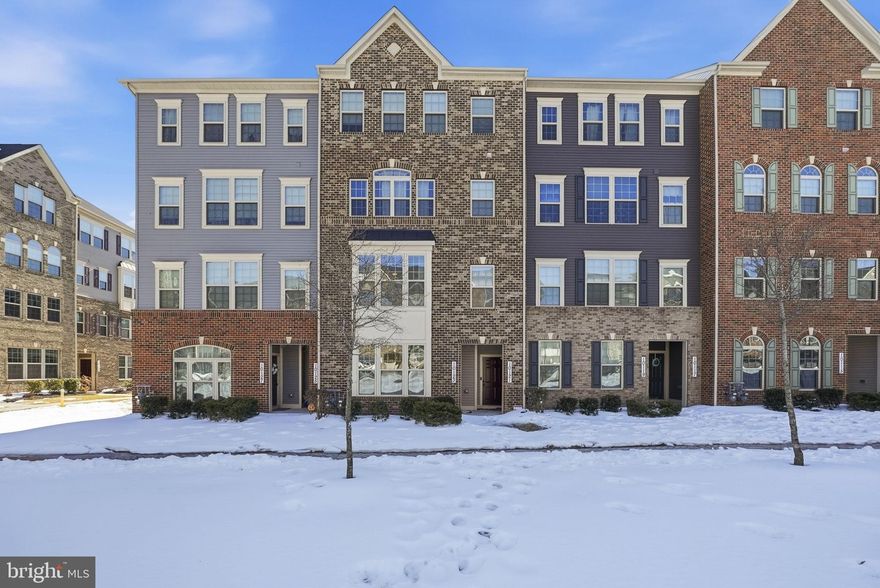 Welcome to Glenn Dale Crossing — where modern design meets effortless everyday living. This impeccably maintained 3-bedroom, 2.5-bath condo-townhome, built in 2019, offers approximately 1,700 square feet of thoughtfully designed space in one of the area's most sought-after communities.
The main level impresses with an open-concept layout anchored by wide-plank engineered hardwood flooring, creating a warm, light-filled atmosphere ideal for both relaxing and entertaining. The chef-inspired kitchen features granite countertops, stainless steel appliances, and generous cabinetry — flowing seamlessly into the dining and living areas for easy, connected living.
Upstairs, the expansive primary suite serves as a true retreat, complete with two walk-in closets with custom organizers and a private ensuite bath. Two additional bedrooms offer versatile space for guests or a home office, with one opening to a private balcony — a perfect perch for morning coffee or a quiet moment outdoors.
Smart home features including a programmable thermostat and built-in media speakers add a layer of modern convenience, while a one-car garage with additional storage rounds out the home's practical appeal.
Ideally situated just minutes from Route 295, I-495, Beltway Plaza Mall, and Eleanor Roosevelt High School, this home also offers easy access to NASA Goddard, the MARC train, and Greenbelt Metro — making your commute into Washington, D.C. seamless.