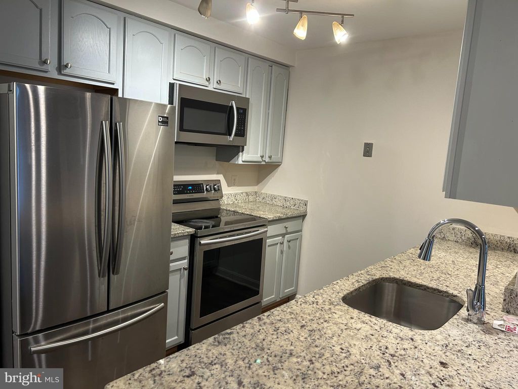 Photo of 13513 Orchard Drive #3513, CLIFTON, VA 20124 (MLS # VAFX2282424)