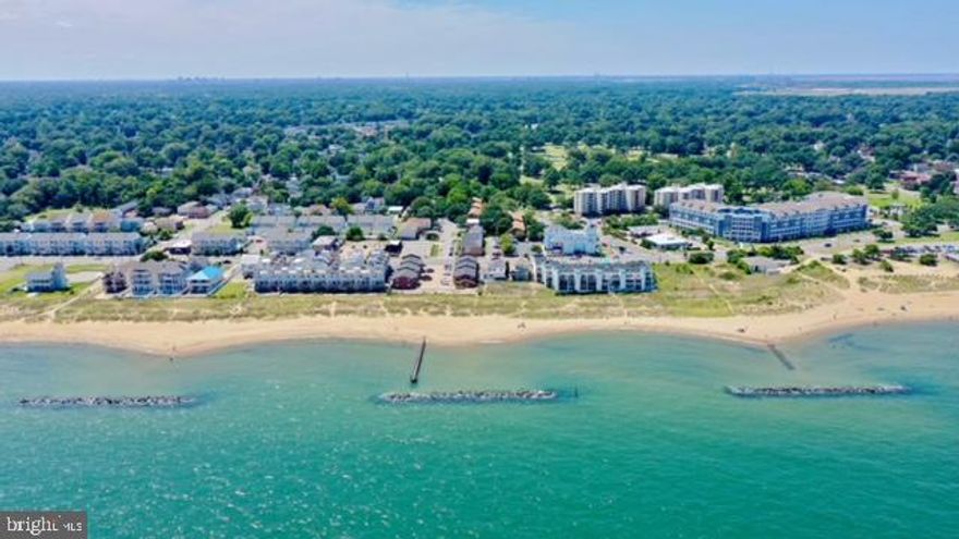 Beachfront duplex offers the ultimate Coastal Lifestyle. Walk out your back door and step directly onto the sand. Great for a homeowner or investors. This property provides the opportunity to live in one unit while renting out the other. Unit 1 features a spacious 1st floor with 2 bedrooms/2bath, water view, patio for outdoor entertaining, and a fully equipped 1/1 mother-in-law suite on the 2nd floor with a balcony. Unit 2 is a cozy 1/1 with gorgeous view, outdoor patio and full kitchen. Upgrades include newer roof 2022 & HVAC 2019, new compressor, new hurricane sliding glass door & windows (11 replaced) and a concrete shed for outside storage. Separate meters for water and electric. Potential for Airbnb and or Triplex