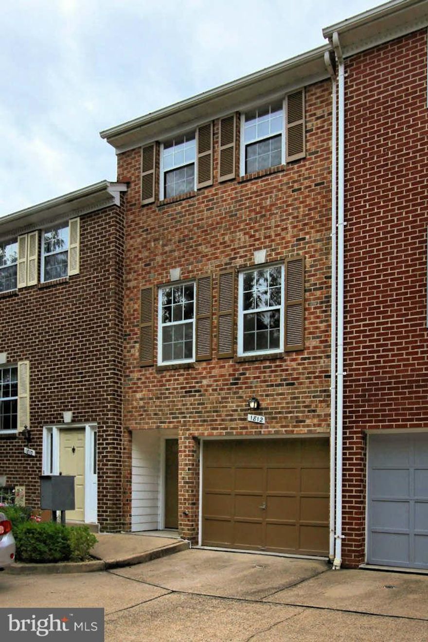 Dogs allowed! Mint condition 3 level townhome w/ Garage! Gleaming oak hardwood floors, gorgeous updated kitchen with granite counters & stainless steel appliances.  This home is immaculate & VERY clean! Dog park across the street and under 1.5 miles to Pentagon Metro and fashion mall. Lower level room with fireplace could be used as a 3rd bedroom. Must use listing broker online application.