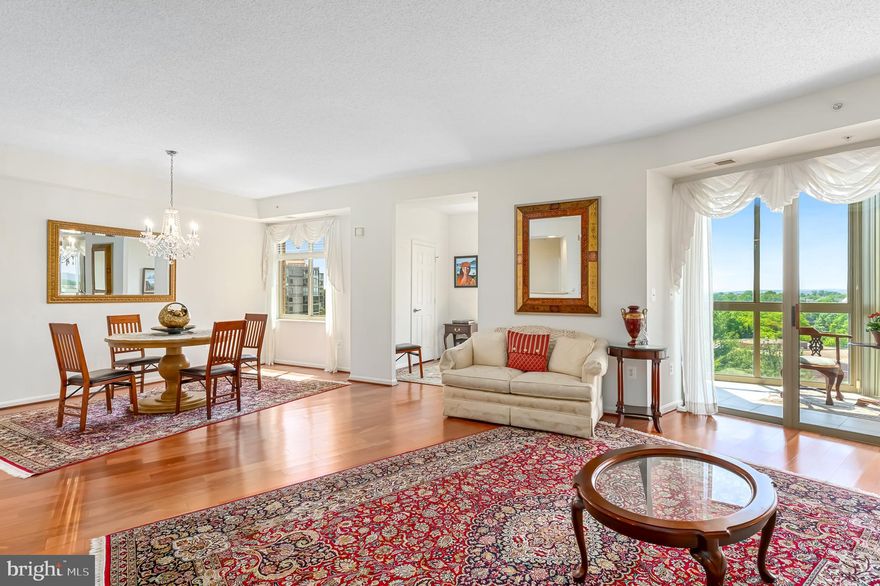 Welcome to Lansdowne Woods, where luxury meets convenience for 55+! This stunning 2-bedroom, 2-bathroom condo on the 10th floor offers breathtaking panoramic views, abundant natural light, and a lifestyle of comfort in the highly desirable Riverview building

Gleaming hardwood floors flow seamlessly through the spacious living and kitchen areas, adding warmth and elegance to the inviting open floor plan giving you plenty of furniture arrangement options for living and formal dining. The kitchen is a chef’s dream, thoughtfully updated with sleek countertops, modern cabinetry, stainless steel appliances, and abundant cabinets and countertop space—perfect for meal prep and storage.

A standout feature of this home is a cozy recessed area, ideal for a home office or den. Whether you’re working from home, or simply need a quiet corner to unwind, this bonus space offers flexibility and function to suit your lifestyle.

The primary suite is your personal retreat, boasting generous closet space, and an en-suite bath with a spacious vanity, soaking tub, and separate shower. The second bedroom is equally spacious and versatile—ideal for guests, a home office, or a hobby room. 

One of the most remarkable features of this home is the largest sunroom available in this community, a truly special space that combines size, functionality, and breathtaking views. Accessible from the living area and both bedrooms via sliding glass doors, this sunroom is bathed in natural light and offers stunning vistas of the Lansdowne Resort, lush nature, and golf course. Whether you want to sip your morning coffee while soaking in the scenery or use the space for your favorite hobbies, this sunroom is a showstopper.

A garage space (#38) does convey with unit and a storage unit: L4-#199. 

Residing in this vibrant 55+ community means you’ll have access to a host of amenities, including a state-of-the-art fitness center, indoor pool, tennis courts, clubhouse, and walking trails. Located just minutes from shopping, dining, and entertainment options, this is the perfect combination of tranquility and convenience.

Don’t miss your chance to experience elevated living at 19355 Cypress Ridge Terrace, Unit 1021. Schedule your private tour today!
