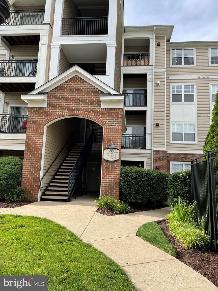 2 bedroom 2 bath 3rd floor condo in desirable Bryson at Woodland Park. Enjoy tree views from your own private balcony.    Both bedrooms have walk in closets, large ensuite bathrooms and ceiling fans.  The kitchen is equipped with granite countertops, stainless appliances, gas stove, newer refrigerator and dishwasher.  The unit is carpeted.  2 parking spots are included, located in the covered garage, and there is an included storage unit to store additional possessions.  Building amenities include an elevator, two outdoor pool, spa, outdoor grills, indoor gym, work lounge and common spaces.  Perfect location with Harris Teeter Shopping center right next door with shops and dining, one mile from the Herndon metro, 5 min to Reston Town Center, about 10 minutes to Dulles Airport and close proximity to major highways.  **Unit is tenant occupied through the end of September.