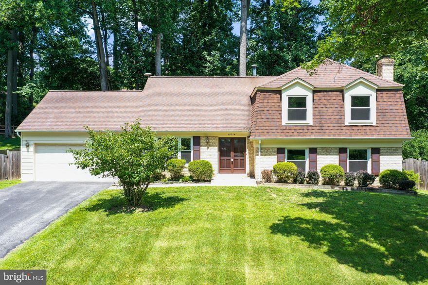 OFFER DEADLINE SUNDAY JULY 16, 4PM.  This is a true FOUR level split located on a lovely lot with lots of trees!  Walk in the front door to foyer area. Main level has  living room, dining room and table space kitchen. There are  lots of windows and a sliding glass door out into backyard from this level of the home.  Step up from foyer area to upper level and there are FIVE bedrooms and 2 full baths.  Primary bedroom has step down to its own private sitting area.  Lower level ONE has a cozy family room with a brick fireplace for the cold winter days!  There is also a hot tub room, full bath and a laundry room on this level.  Step down to lower level TWO to find a recreation room, perfect for pool table or ping pong table equipped with refrigerator, bar and sink.  This level also has a utility room.  You have access to the backyard from lower level one, the dining room or the garage.  The fenced backyard has a shed with electricity,  deck and many trees giving it a very peaceful setting to enjoy backyard cookouts or just quiet relaxation!  Home has been freshly painted and there is new carpet throughout!  Front load two car garage with bonus area in the back for all of your tools.  Total square feet is 3,463.  Close to ICC and shopping.