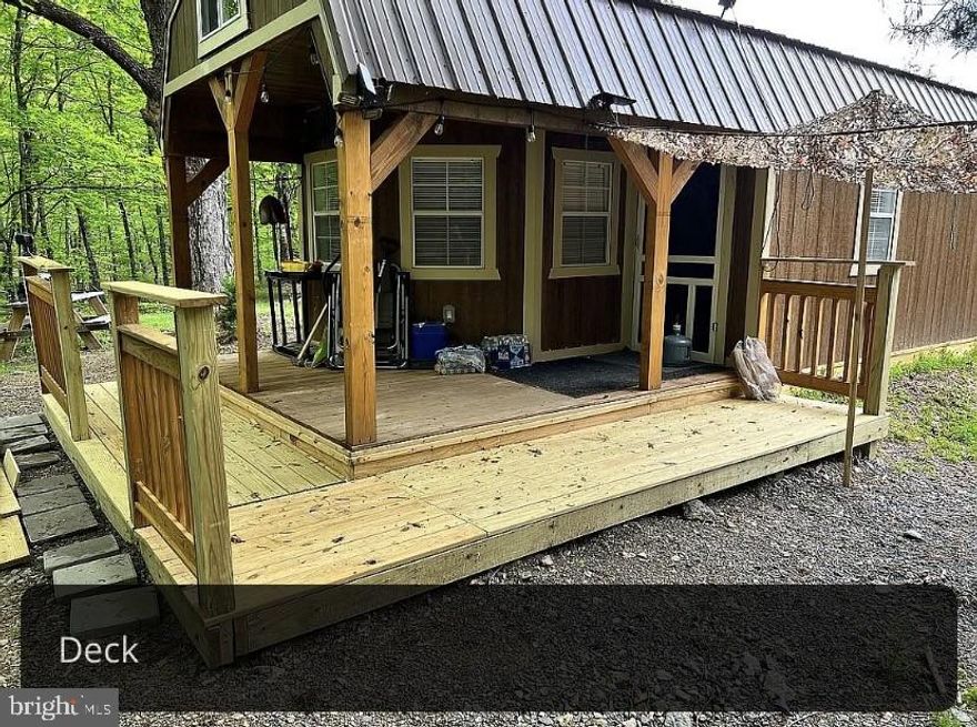 2.5+ ACRES / MOUNTAIN STREAM!!  NO HOA!!  This property features 2 cabins, each with its own generator, tankless water heater, and mini-split heat/air!  Overlooking your own bold mountain stream and mature hardwood forest!  Excellent paved road access and READY TO ENJOY!!  DON'T MISS THIS UNIQUE PROPERTY... SCHEDULE YOUR APPOINTMENT TODAY!!