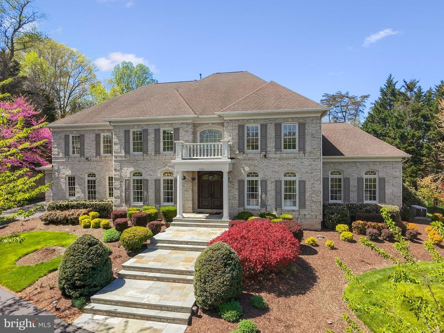 Welcome to 1188 Windrock Dr, an elegant 6-bedroom, 6-full, and 2-half-bath Colonial estate nestled on a sprawling 1.72-acre lot in one of McLean’s most prestigious and desirable communities. This stately 9,713-square-foot residence offers unparalleled craftsmanship and a thoughtfully designed layout, making it feel both grand and cozy.

Upon entering, you're greeted by a grand spiral staircase that sets the tone for the home's sophisticated ambiance. The main level features an expansive primary suite, providing convenience and privacy, while a second owner's suite is located on the upper level. The gourmet kitchen, equipped with premium Viking appliances, seamlessly flows into a two-story family room adorned with floor-to-ceiling windows, bathing the space in natural light.

Entertain guests in the embassy-sized dining and living rooms, or retreat to the fully finished lower level, which boasts a full wet bar, exercise room, game area, craft/hobby room, and ample storage space. The oversized, side-loading three-car garage is accessed by a sweeping driveway, offering additional parking space for guests.

The home's grounds are extensive, with landscaped terraces, yet mostly flat and open, offering endless possibilities. 1188 Windrock Dr is in the Langley High School pyramid and is just 10 minutes from Tysons, 25 minutes from Washington, DC, and 20 minutes from Dulles.