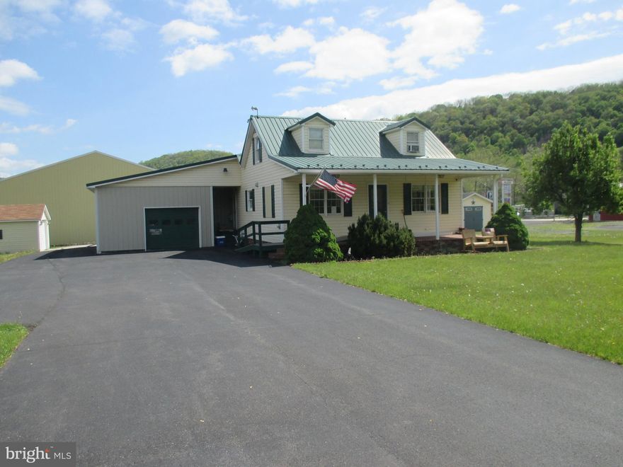 PRIME COMMERCIAL BUILDING IN HIGH TRAFFIC COMMERCIAL ZONE. CORNER LOT ADJACENT TO POTOMAC PLAZA AND WVU MEDICINE. STEPS AWAY FROM WAL MART AND STATE RTE 220. LARGE ATTACHED GARAGE, STORAGE SHED, AND 12X15 DETACHED GARAGE. MULTIPLE COMMERCIAL OPPURTUNITIES (OFFICE, RETAIL, MIXED USE). BUILDING WAS COMPLETELY REMODELED AND UPDATED WITH VINYL SIDING AND METAL ROOF. FABULOUS LOCATION WITH HIGH TRAFFIC COUNT AND GOOD VISIBILITY.  DON'T WAIT, CALL TIM! SQUARE FOOTAGE IS ESTIMATED.
