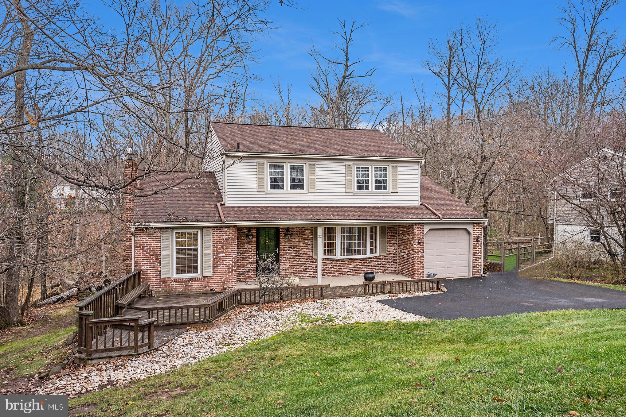 Welcome to 82 Skyline Drive.  This four bedroom, 3 bath Colonial, located in the desirable Methacton School District in Lower Providence Township, sits at the start of a quiet cul-de-sac and in a safe, friendly neighborhood where most people know each other well.    Before entering this home, you will find a cozy front porch that was extended by a front deck that offers a larger area to enjoy, relax and entertain.  As you enter this home, you'll find a center hall staircase, and to your left, you will enter a cozy and sun-filled family room with a fireplace, large, casement windows and sliding doors that offer plenty of sunshine and breezes, making this a great room to relax. This space also offers a full bath right on the main floor.   To the right of the stairway sits the spacious main living room with a gorgeous bay window, admitting more natural light, making this a great space to entertain friends and family as it connects to the open concept, kitchen, dining and sitting area.   This space offers many upgrades such as beautiful wood cabinets contrasted with granite countertops, two large ovens, tile floor and an abundance of light that pours through the large,Anderson kitchen windows and sliding doors.  The tranquil, picturesque views that surround you in this space will make you want to spend all your time in this part of the home.  This custom space was redesigned by previous owners to create an open concept Kitchen/Dining/Sitting area by converting part of the garage into living space and part of the garage was converted into a large storage area.  Step through the sliding doors to a magnificent deck that runs the full width of the home and can be accessed by both kitchen/dining area and family room sliders.  This private outside space is perfect for those summer barbeques, entertaining friends, or just relaxing and taking in those "skyline views".  Upstairs you will find a bright and cheery hall bath along with the large Master Bedroom with its own master bathroom.  Three other nice-sized bedrooms with ample closets complete this level.  One of the bedrooms was previously converted to a convenient, upstairs laundry room but could easily be converted back.  Unlike most of the Colonials built in this neighborhood, this home has a full, unfinished, walkout basement.  This space is just waiting to be finished for that mancave you always wanted, workout/office space or a playroom for the kids.  The basement also has a mini split system in place that provides heat in the Winter and cooling in the Summer.  This home also has zoned heat, a 200-amp electrical service, a water softening system, newer A/C unit and a heated roof system installed to help with melting ice and snow.  You don't want to miss out on this one, Make your appointment today!