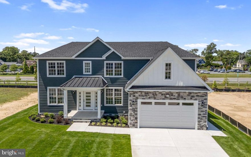WHY THIS HOME WORKS FOR YOU.  4,000+ SQ FT OF FINISHED LIVING.  2,222 sq ft unfinished basement ready for your vision.  You’re not just buying square footage—you’re gaining flexibility for today and possibilities for tomorrow.  Grand Yet Inviting Main Living Area: Two-story ceilings, Cozy gas fireplace, Walls of natural light, Open flow ideal for entertaining.  Whether hosting holidays or enjoying quiet nights in, this space rises to every occasion.  A KITCHEN THAT DELIVERS created for real cooking and real gatherings: Oversized center island with breakfast bar, Quartz countertops, 7-burner gas cooktop, Microwave/oven wall combo, Dedicated coffee bar, Second dining area, Formal dining room nearby for special occasions.  This is where guests gather—and where memories are made.  A sunroom you will actually use! Bright. Peaceful. Versatile. Perfect for morning coffee, afternoon reading, or winding down at sunset.  TWO PRIMARY SUITES = TRUE FLEXIBILITY.  Main-Level Owner’s Suite: Walk-in tile shower.  Dual vanities.  Spacious walk-in closet ideal for long-term convenience or single-level living. Upper-Level Owner’s Suite.  Private luxury bath, Walk-in closet, sitting area retreat Perfect for multi-generational living or hosting extended guests in comfort. Room for everyone Upstairs includes: Three additional generously sized bedrooms.  Two additional bathrooms (including one en-suite)Privacy. Space. Comfort for family and visitors alike. A basement with endless potential 2,222 square feet ready for home theater, Gym, Recreation room, Wine cellar.  Additional guest quarters, customize it when you’re ready—on your timeline. Elevated finishes throughout.  Luxury vinyl plank flooring, elevated finishes in main living areas.  Quartz countertops in every bathroom, hardwood stairs with black wrought iron spindles.  Tankless water heater.  Long-term value. Modern efficiency. Outdoor living that feels like a retreat, covered back porch with accented ceiling, custom paver patio.  Perfect setting for entertaining or quiet evenings under the stars. in the sought-after Olde Town community, you’ll enjoy: Community outdoor pool.  Direct access to the 16-mile Junction & Breakwater Trail & close proximity to Cape Henlopen State Park, minutes to downtown Lewes shops and restaurants.  Everything you love about coastal living—right outside your door. This home delivers—all in one of Lewes’ most desirable new communities - Olde Town. Call Today!