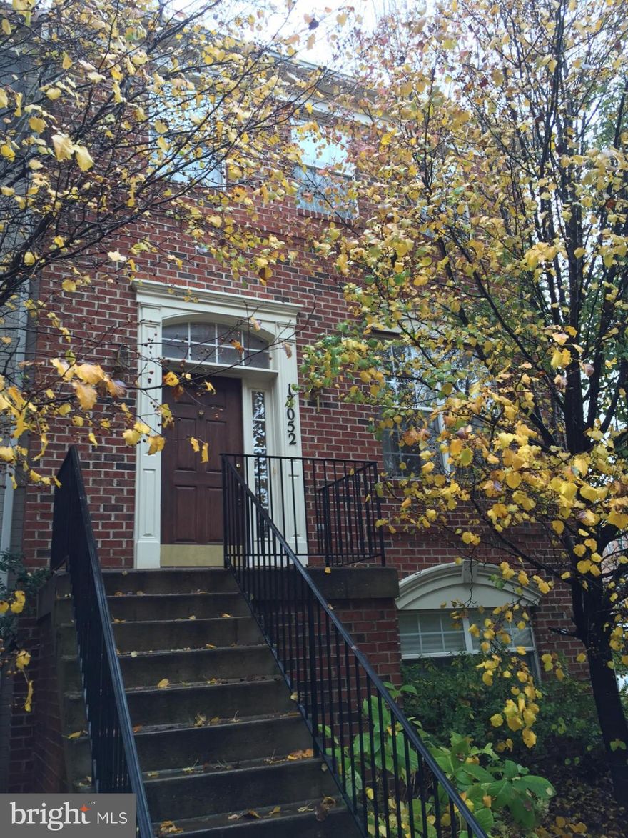 Lovely, open floor plan great for entertaining, 3 lvl end-unit TH, w/ lots of natural light, wood flrs on main level. Kit w/ island & updated appliances w/ exit to deck, family rm w/ fpl - Upper lvl MBR w/ walk-in closet & private bath + 2 addnl bedrms + hall bath . laundry on bedrm level, & lower lvl office/den - 2 car garage, walk to TownCenter shops, restaurants. Near I-270, Marc Rail.