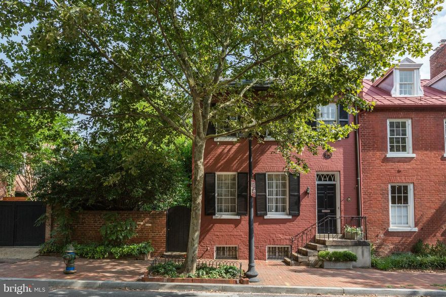 Epitome of old Georgetown elegance w/one of the most beautiful gardens in the city! Abundant natural light; luminous living + dining rms, renov kit, wonderful 1st floor fam rm; 5 wood burning fpl. Multiple points of access from house to private walled garden/saltwater pool. 2nd lvl - 4BR/3BA including master suite addition; skylit top floor BR/BA; LL au pair suite.