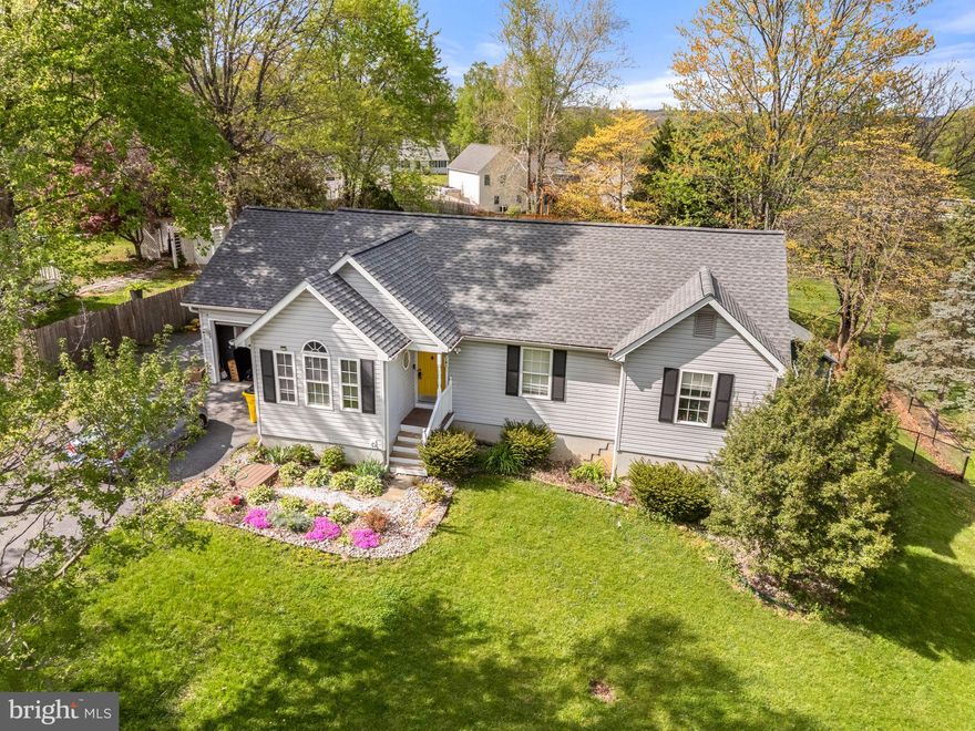 Welcome home to Tuscawilla Hills, where charm, space, and opportunity come together in a setting buyers love. This 4 bedroom, 3 bath rancher offers 2,086 finished square feet and the kind of layout that makes everyday living easy while leaving room to make it your own.  This property is being sold As-is.  

From the moment you step into the spacious living room with its Palladian windows, cathedral ceiling, and luxury vinyl plank flooring, this home feels inviting and full of possibility. The kitchen with granite countertops and electric appliances opens to the dining area, where French doors lead out to the deck and backyard, creating a comfortable flow for gathering, entertaining, or simply enjoying a quiet evening at home.

The outdoor space is ready for summer fun and everyday living, with a chain-link fenced yard, above-ground pool, two storage sheds, and room to enjoy the outdoors. The yard slopes but is mostly flat, offering usable space for pets, play, gardening, or relaxing weekends at home. A gravel patio outside the lower level bedroom adds even more function and flexibility.

The main level features a primary suite with private bath and walk-in closet, along with two additional bedrooms and a full hall bath. The partially finished basement expands the possibilities with a large fourth bedroom, French doors to the backyard, ceiling fan, and a generous dressing room or walk-in closet, plus a full bath, laundry room, utility room, and extra storage.

Set in a great neighborhood close to downtown Charles Town, restaurants, shops, and commuter routes, this home offers the perfect chance to settle into a desirable location and create something special. Comfortable as it is and full of potential for the future, this is a home where your next chapter can truly begin.