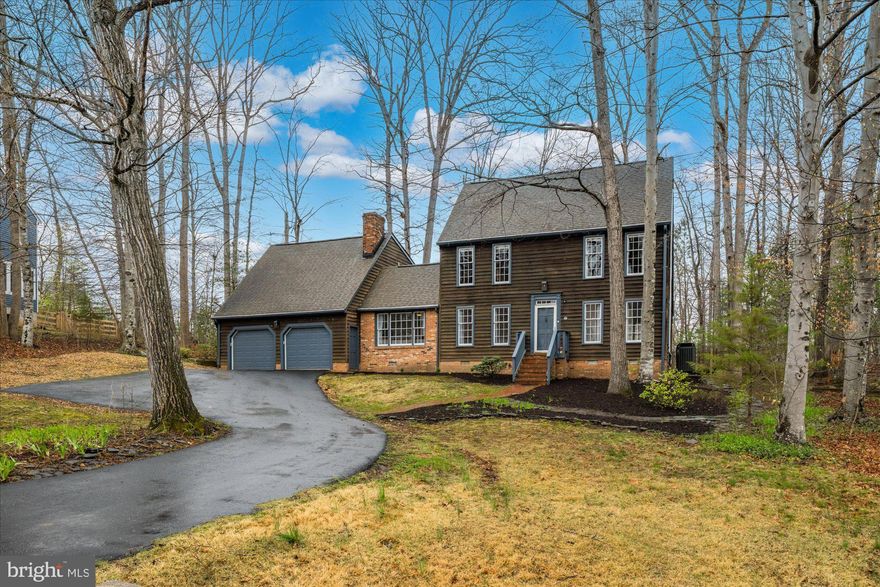 Welcome to 1015 Atlantic Drive in the highly sought-after Aquia Harbour—where privacy, space, and lifestyle come together in one exceptional home.

Perfectly positioned on a quiet cul-de-sac, this beautifully maintained 4-bedroom, 3.5-bath residence spans three finished levels and offers over 3,100 square feet of living space, all set on an oversized lot backing to open space—creating a rare sense of tranquility and seclusion. A fully fenced backyard provides the perfect setting for entertaining, pets, or simply unwinding in your own private retreat.

Inside, you’ll find a light-filled, thoughtfully designed layout enhanced by stylish updates throughout. The spacious living areas flow effortlessly, making everyday living comfortable while also ideal for hosting gatherings. With three finished levels, there’s flexibility for work, recreation, or additional living space to suit a variety of needs.

A standout feature of the home is the finished bonus space over the garage, complete with a kitchenette and attached full bathroom—offering exceptional flexibility as a private workspace, studio, or additional living area. (Not a separate dwelling unit.)

The home also features a 2-car garage plus additional driveway parking, offering convenience for multiple vehicles and visitors.

Living in Aquia Harbour means access to an incredible array of amenities, including two pools, a clubhouse, golf course, horse stables, marina access, parks, and more—all within approximately 3 miles. It’s a true lifestyle community designed for both relaxation and recreation.

Commuters will love the prime location just off Interstate 95, providing easy access to Fredericksburg, Richmond, and Washington.

If you’ve been searching for space, privacy, and a vibrant gated community—all in a move-in-ready home with impressive updates—this is the one.