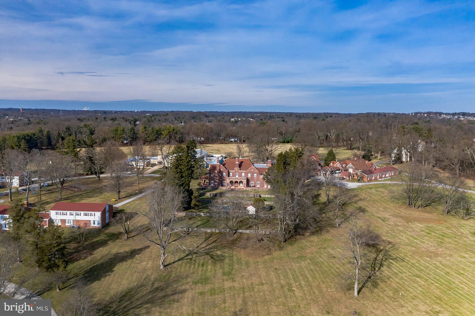 This beautiful, 43.5-acre property at 452 South Roberts Road is now for sale just nine miles west of Philadelphia in Bryn Mawr, Pennsylvania. If your clients are looking for a site to expand or establish facilities this is a unique opportunity to do so. Villanova University, Bryn Mawr College, Rosemont College, and Bryn Mawr Hospital are all located within two miles of the property, while the zip code had the fifth-highest home prices in Pennsylvania in 2020. The average household income in the area is $105,000. The Radnor school district ranked among the top ten in the state. The property is currently zoned Planned Institutional, allowing college, school, religious, or student infirmary use by right. By special exception, a home for children/elderly/handicapped/indigent, a medical or health center, convalescent home, or nursing home is permitted. As an accessory use, playing fields or recreational facilities, dormitories, and other student or faculty dwellings are permitted. Single or multifamily residential use would require a rezoning. Surrounding neighborhoods are zoned R1, R1A, and R2 which include one acre, 30,000 sf, and 20,000 sf lots respectively. Preliminary drawings show that 33 or 32 lots could be placed on the property are included in the MLS documents. The asking price of $17.5M is for a transaction involving a reasonable (+/-60 day) due diligence and a +/- 30 day period until closing with no approval contingencies. The owner is also willing to consider transactions that involve approval contingencies. If you are interested in such a transaction then the price and deposits should recognize the fact that the owner will be required to bear carrying costs, loss of interest, and the risk of approvals, amongst other things. Access to the Septa Norristown High-Speed line (Roberts Road Station) is one mile away, Septa Regional Rail line (Bryn Mawr Station) and I-476 (the Blue Route) are within two miles and Amtrak (Ardmore Station) is three miles away. Ten buildings on the property (previously the Presbyterian Children’s Village) include the Glencoe Estate Mansion built 1907 (Robinson Hall with administrative offices), the Youth Cultural Center (classrooms, gym, cafeteria, religious center, offices, and maintenance area), the carriage house (residence apartments, offices, and maintenance area), six cottages (dormitories) and caretaker’s home. Playing fields are located on the northwest side of the property. Please do not enter the property unescorted for any reason. There are cameras on site. Contact the listing agent via email to arrange for a tour with the listing agent and owner's representative. We are now requesting final and best offers from all interested parties in the form of a written LOI by January 12, 2022. Please review the letter of intent guidance information in the MLS documents section. The current owner is a tax-exempt organization so no real estate taxes are shown. All information provided is from sources deemed reliable but no warranty or representations are made as to the accuracy of this information. This information is subject to errors, omissions, later changes, prior sale, leasing, financing or withdrawal without notice, etc. No liability of any kind is to be imposed against the Broker herein.