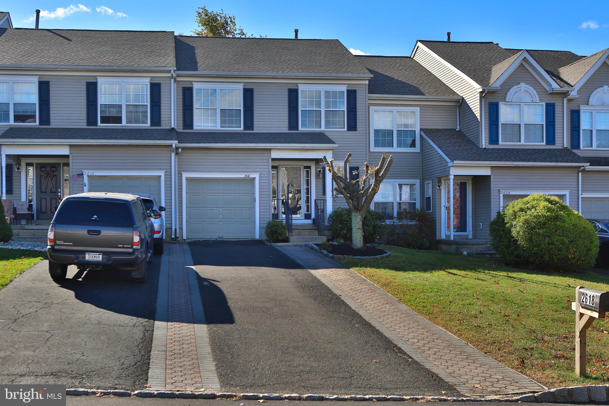 Beautiful townhome in one of the best exterior lots in Deer Run Courts. Home features remodeled kitchen & bathrooms, upgraded light fixtures, & finished walkout basement. The main level has new floors throughout - this floor has a powder room, a formal dining room, living room w/ gas fireplace, and updated kitchen that opens to a large rear deck. Upstairs you will find a spacious master bedroom w/walk-in closet & updated master bath w/granite vanity, tile floor, and fully tiled shower. Two more nice sized bedrooms share the updated hall bath. Convenient second floor laundry completes this level. Downstairs, the finished walkout basement provides a whole extra level of additional living space! The paver patio overlooks preserved land & community open space. This location has townhome convenience while making you feel like you're in a single! Storage room, garage, and floored attic provide ample storage space. Close to commuter routes, walking distance to community park and Jamison shopping center!