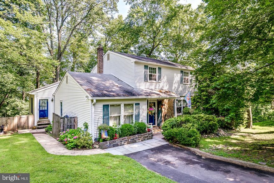 Welcome to 723 Falcon Drive in Springfield Township School District.  Enjoy the privacy and quiet in a cul-de-sac.  From the front door enter the main hallway with the dining room on the left, a powder room and coat closet in the hallway, and a living room on the right.   The eat in kitchen is straight through the hallway but can also be accessed through the living room, which is how the pictures are ordered.  Off the kitchen is the main floor laundry room, housing a washer, dryer, tub, storage cabinets, counter top, and additional fridge.  Through this room you will reach the addition with vaulted ceiling.  A sizeable deck can be reached from both the addition and the kitchen for entertaining, grilling, or simply relaxing in nature with views of the trees.  The second floor contains a full bathroom at the top of the stairs and three bedrooms with an additional full bathroom in the primary bedroom.  The primary bedroom also has a walk-in closet.  The full finished basement has numerous possibilities.  It contains a number of storage closets as well as an additional bedroom with full bathroom and outside access.  Beautifully treed yard with shed in rear.  Entire backyard fenced with two gates.  The second gate is near the shed for easy access.