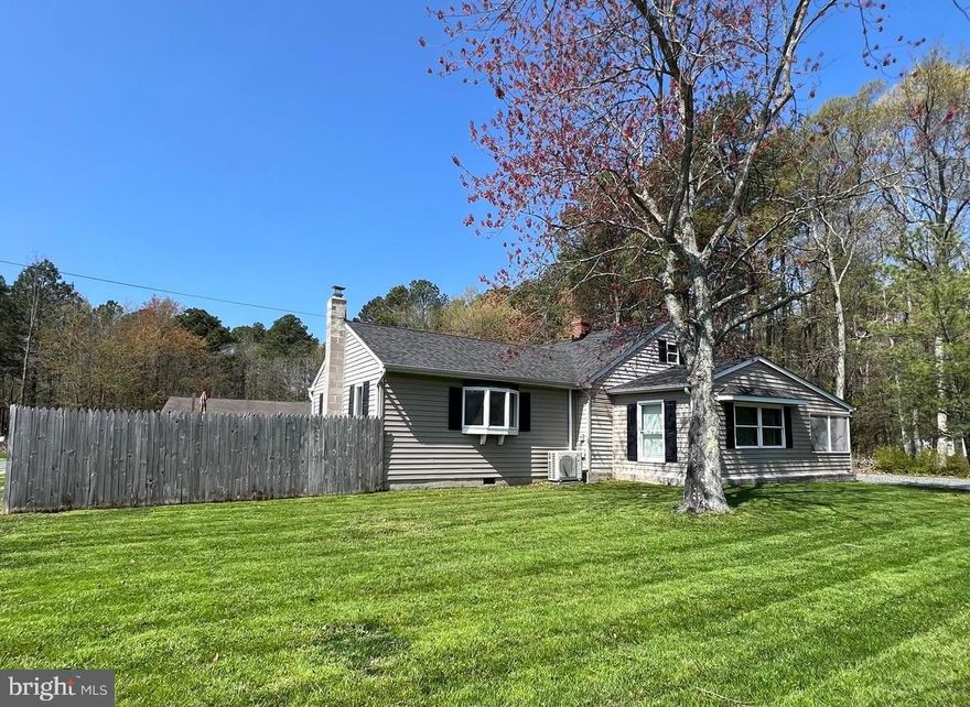 Welcome to this charming 3-bedroom, 1.5-bath Cape Cod, thoughtfully remodeled from top to bottom. Priced under appraised value, this home offers instant equity. With its traditional exterior, the interior has been beautifully updated and offers approximately 1,600 sq. ft. of comfortable living space. Major updates include a new roof and siding, luxury vinyl plank flooring, stainless steel appliances, and newly added central air conditioning. The newly updated kitchen opens to a welcoming main living area, centered around a beautiful fireplace that draws you in. Every detail has been carefully refreshed, creating a warm, move-in-ready home. The first-floor primary bedroom features a versatile sitting area, perfect for a nursery, office space, or just a cozy spot to curl up with a good book. Enjoy your morning coffee on the screened-in porch, entertain guests on the large deck, and relax in the fenced-in yard for privacy. For those who like to tinker or need extra space, there is a workshop in the backyard.

Conveniently located just minutes from the Kent Narrows, this home provides easy access to shopping, hospitals, beaches, fishing, hunting, top restaurants, parks, boat landings, and marinas. Easy access to Route 50 and 301.