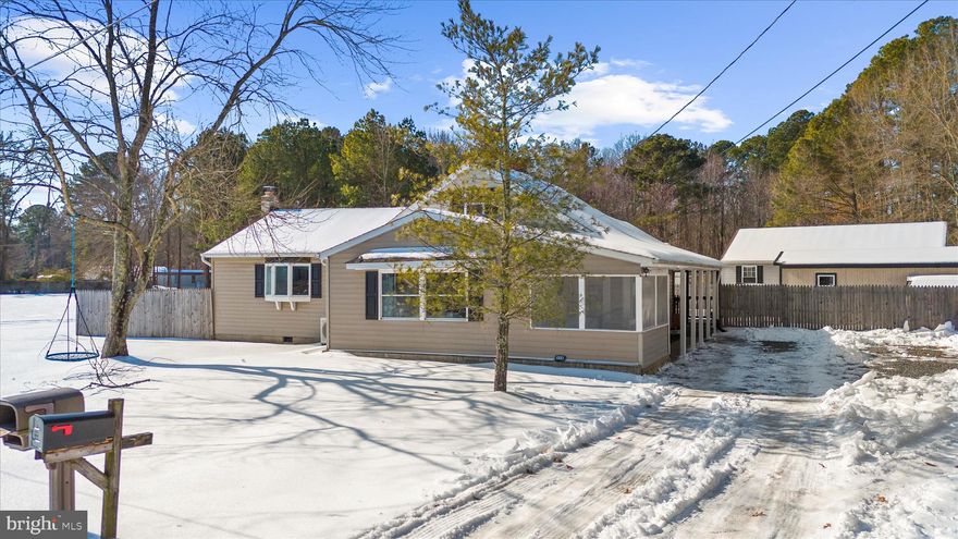 Welcome to this charming 3-bedroom, 1.5-bath Cape Cod, thoughtfully remodeled from top to bottom. With its traditional exterior, the interior has been beautifully updated and offers approximately 1,500 sq. ft. of comfortable living space. Major updates include a new roof and siding (2019), luxury vinyl plank flooring, stainless steel appliances, and newly added central air conditioning. The newly updated kitchen opens to a welcoming main living area, centered around a beautiful fireplace that draws you in. Every detail has been carefully refreshed, creating a warm, move-in-ready home. The first-floor primary bedroom features a versatile sitting area, perfect for a nursery, office space, or just a cozy spot to curl up with a good book. Enjoy your morning coffee on the screened-in porch, entertain guests on the large deck, and relax in the fenced-in yard for privacy. For those who like to tinker or need extra space, there is a workshop in the backyard.
Conveniently located just minutes from the Kent Narrows, this home provides easy access to shopping, hospitals, beaches, fishing, hunting, top restaurants, parks, boat landings, and marinas. Easy access to Route 50 and 301.