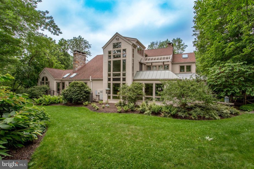 Unique, serene and at one with nature and natural beauty, Havenwood is an extraordinary
estate available for the first time since it was designed and custom built. In addition to being a
luxurious house with gorgeous grounds, it has evolved into being a one-of-a-kind living art
gallery, inside and outside. From the moment you drive up to the entrance of the property and
see the handcrafted stone and iron gate you will realize that something special awaits you. The
sophistication and beauty of the home is matched by the ten acres of private and beautiful land
that have undergone an amazing transformation. There are so many architectural and
distinctive features inside and outside they are detailed in a separate page together with the
story of Havenwood. This is a brief overview describing what you will see when you visit. From
the long driveway, pass through another custom gate to the intricately designed paver
courtyard. Step inside to the foyer through a custom leaded glass front door with a sunburst
design. Readily apparent is the beautiful woodwork, soaring ceilings and windows, and elegant
free flowing floor plan. A separate library is the first place to see an incredible wall of cement
art that surrounds a fireplace. The artisan crafted a cement wall that looks like bark with 3-D
mushrooms growing from it.  The living room with a Heatilator woodburning fireplace is filled
with natural light and the beauty of the outdoors. The adjoining dining room is part of the open
floor plan with family room, casual dining area in front of another fireplace, and a gourmet
kitchen with high-end appliances. These areas have comfortable cork flooring. A window
enclosed room with cedar walls is a multi-purpose place to enjoy in all seasons and it opens to a
large deck area. A main floor primary bedroom suite has a stunning bathroom and a powder
room and laundry room with a dog washing area complete this level. Upstairs has three
bedrooms. The spacious primary bedroom suite includes a sitting area, fireplace, two private
balconies, a dressing area and closets, luxurious bathroom, and a separate room for meditation,
yoga, or whatever suits your lifestyle. Enter it through two stained glass doors and take note of
the intricate stonework. A dramatic 2-level bedroom called “treetops” has a sitting area that
opens to its own balcony and the stairs take you up to the incredible bedroom with built-in
beds and intricate woodwork in a tree and branches design. There is another bedroom, a
beautiful hall bathroom, an open loft area and down the hall is an office with staircase to the
garage. A delightful surprise is the finished basement that is the legacy of the late owner’s
passion for model trains. You will likely never have seen anything like this. Adults to young
children will appreciate the intricate layout and decorative accessories of a “real life” train
route through a town. Outdoors the water features include a swimming pool, outside showe,and koi pond.
Walking trails, a labyrinth, a raised organic garden with water piped to it, a charming chicken
coop and even a maypole together with exquisite specimen plantings and trees provide a park-
like setting filled with flora and fauna and daily enjoyment. And it’s a birdwatcher’s paradise.
Two separate buildings provide many possibilities for use. Above the 2-car detached garage is a
spacious open room with bathroom that was once used as an artist studio. Deeper into the
property there is a standalone two-level “entertaining center” built with many distinctive
features incorporated into its design. Large gatherings are extraordinary in this setting. The
ambiance and character of this estate is unmatched. A haven of tranquility, luxurious living, and
being one with nature provides a superb lifestyle that will wrap you in comfort and calmness.
Welcome home to Havenwood!