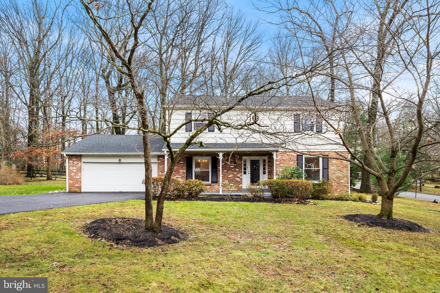 Located on a charming cul-de-sac of just three homes, this tastefully updated center hall colonial is part of Shand Tract, a close-knit, sought-after community known for its active neighborhood association, family-friendly events and welcoming spirit. Over $100,000 of recent improvements! As you pull into the home’s side driveway, notice the newly painted shutters and front door. From the breezy front porch, step inside and admire the gleaming refinished hardwood floors throughout, along with neutral (fresh) paint and recessed lighting. From the foyer, French doors open to a sunny dining room with oversize window. The dining room connects to a beautifully refreshed, light-filled eat-in kitchen with sparkling white cabinetry and peninsula seating, plus a new range hood, farmhouse sink and tile backsplash. The kitchen spills into a spacious family room with wood-burning fireplace and picture window framing the scenic backyard vista. Other first floor highlights include a bright and airy front living room, renovated powder room and laundry/mudroom with utility sink and direct access to the attached, two-car garage. An oversized landing anchors the second floor, where hardwood floors continue throughout. In addition to three spacious secondary bedrooms and a full hallway bath, this level features an expansive primary suite with dual walk-in closets and ensuite full bath. Back downstairs, the large unfinished basement offers plenty of storage and endless potential for additional living space (refinish as one open area or subdivide!). Outside you’ll find a lovely screened-in porch adjacent to a brick patio—perfect for entertaining, casual family meals and everything in between! Just beyond sits over half an acre of flat, scenic greenspace dotted with mature trees and plantings. Zoned for award-winning Tredyffrin/Easttown School District, this home is mere minutes from major commuter routes and popular Main Line destinations, including downtown Wayne, Gateway Shopping center, the Devon Horse Show and Jenkins Arboretum & Gardens. Don’t miss this chance to own a premier property in one of Devon’s most desirable neighborhoods!  Floor plans, video tour walk through and inspection report available.