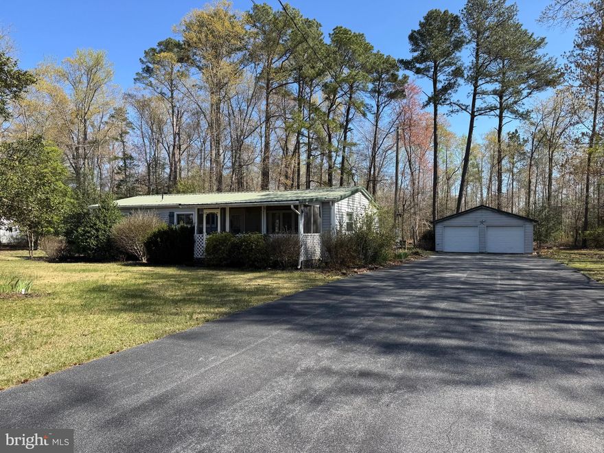 A  .91  wooded lot with endless possibilities—come bring this home back to life! Adorable front porch this three-bedroom, two-bath home is being sold in as-is condition and is priced to sell.  The oversized two-car garage offers the perfect space for a workshop or man cave. Nestled among mature trees with a private backyard, this secluded and sought-after location offers peace and potential. Don’t miss out—call today to schedule your showing!