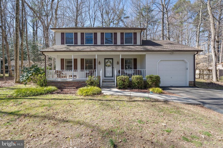 Welcome home! Beautiful Colonial with covered front porch & covered rear porch and deck. Main level features spacious living room, dining room, kitchen w/ granite counter tops. Upper level has large master bedroom with walk in closet,  two additional bedrooms + 2 full updated bathrooms. 1 car garage, private wooded back yard. New roof (2021), New microwave (2021) New slider installed (2017). Sought after Laurel Branch Subdivision. Excellent location for DC/VA commuters, Indian Head Naval Base, Joint Andrews AFB and Pax River Base. Minutes to National Harbor Shops, Casino & Restaurants. Welcome Home 8656 Valley Drive