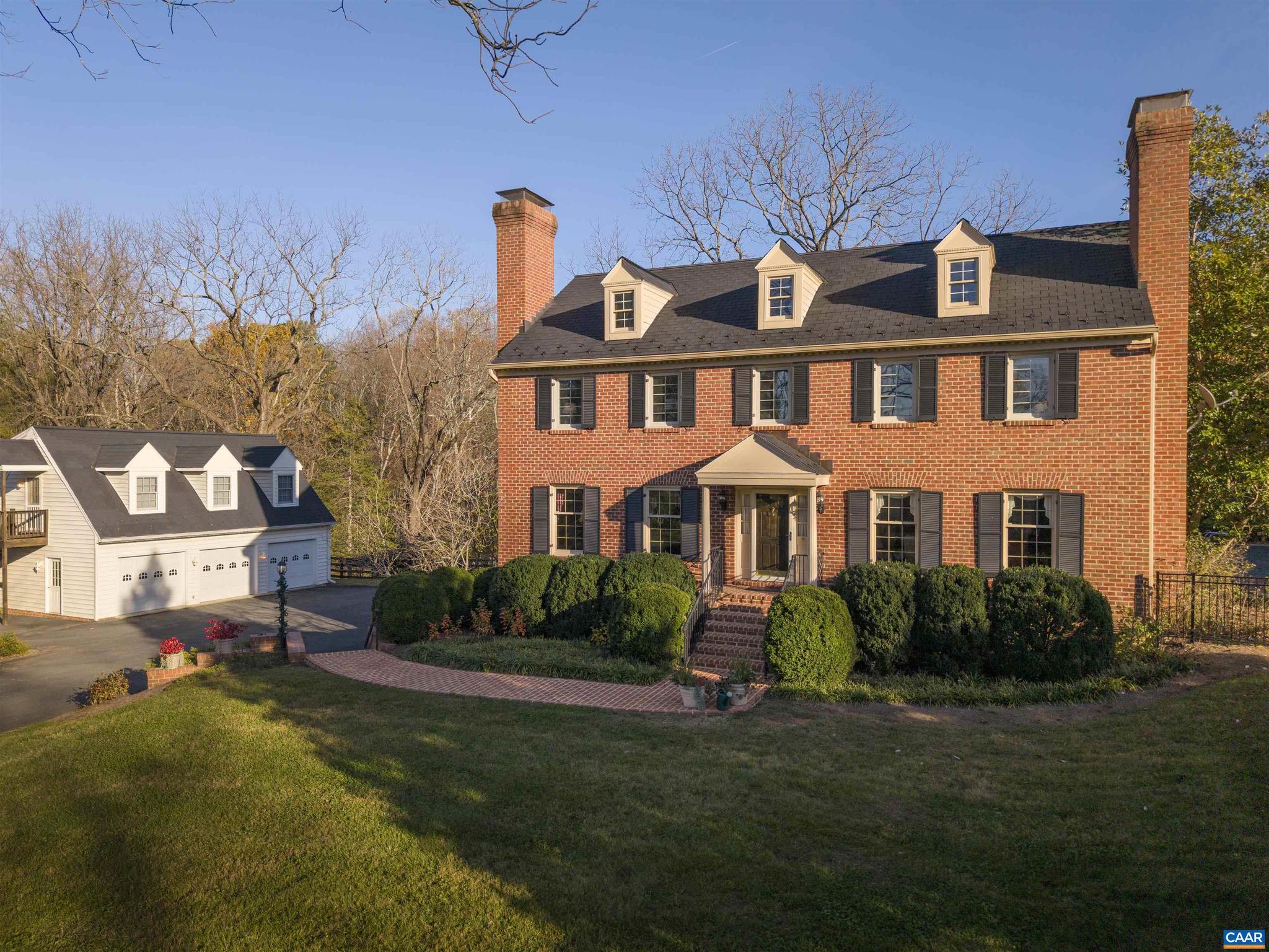 20-acre estate caliber property minutes from Charlottesville. A classic, well-built brick residence with 4 bedrooms, 2 full baths, and 2 half baths, finished walkout basement, pool, 3-bay garage and apartment sits nestled into the rolling acreage of this exceptional offering. A second, elevated site with an existing cottage enjoys exceptional mountain views and privacy. Keep the charming cottage or build something new. UPPER SITE HAS HUGE POTENTIAL. Perfect as a main residence or family compound. Less than 10 minutes to downtown Charlottesville, yet completely private.,Solid Surface Counter,Wood Cabinets