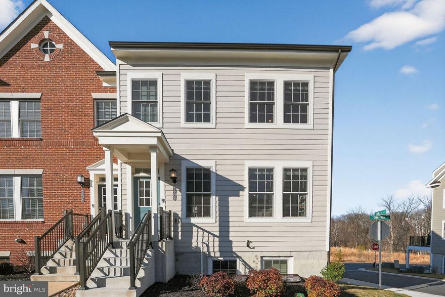 Luxury Townhome Living with Single-Family Scale: Experience the perfect blend of low-maintenance convenience and expansive single-family square footage in this rarely available end-unit, the largest model in the highly sought-after Parkside at Warfield development.
Spanning four finished levels, this home is flooded with natural light thanks to its end-unit position and additional windows, creating a warm and inviting atmosphere.
The main level is designed for entertaining, featuring a huge central island that opens seamlessly to the dining and family rooms. Guests can park easily along the street and enter directly onto this level, or you can take the gathering outside to the main level deck.
A true showstopper, the top-floor loft serves as an ideal home theater or private lounge. It includes a bathroom and access to an upper deck offering serene, premium views of the local pond and wildlife.
The third floor hosts a spacious primary suite with a large walk-in closet and a private luxury bath. Two additional bedrooms, a second full bath, and a conveniently located laundry room complete this level.
Lower level provides a flexible space perfect for a home office or a fourth bedroom, complete with its own attached full bathroom.
The 2-car rear-entry garage features professional epoxy flooring and a dedicated EV charging outlet.
Situated on a quiet, no-through street, the home backs to a lush forest conservation area. Enjoy immediate access to walking paths and the community park right behind the property.
Located with quick access to Rt. 32, you are just a short, scenic stroll from Downtown Sykesville. Use the community's dedicated walking tunnel to enjoy local shops and dining without ever needing your car.