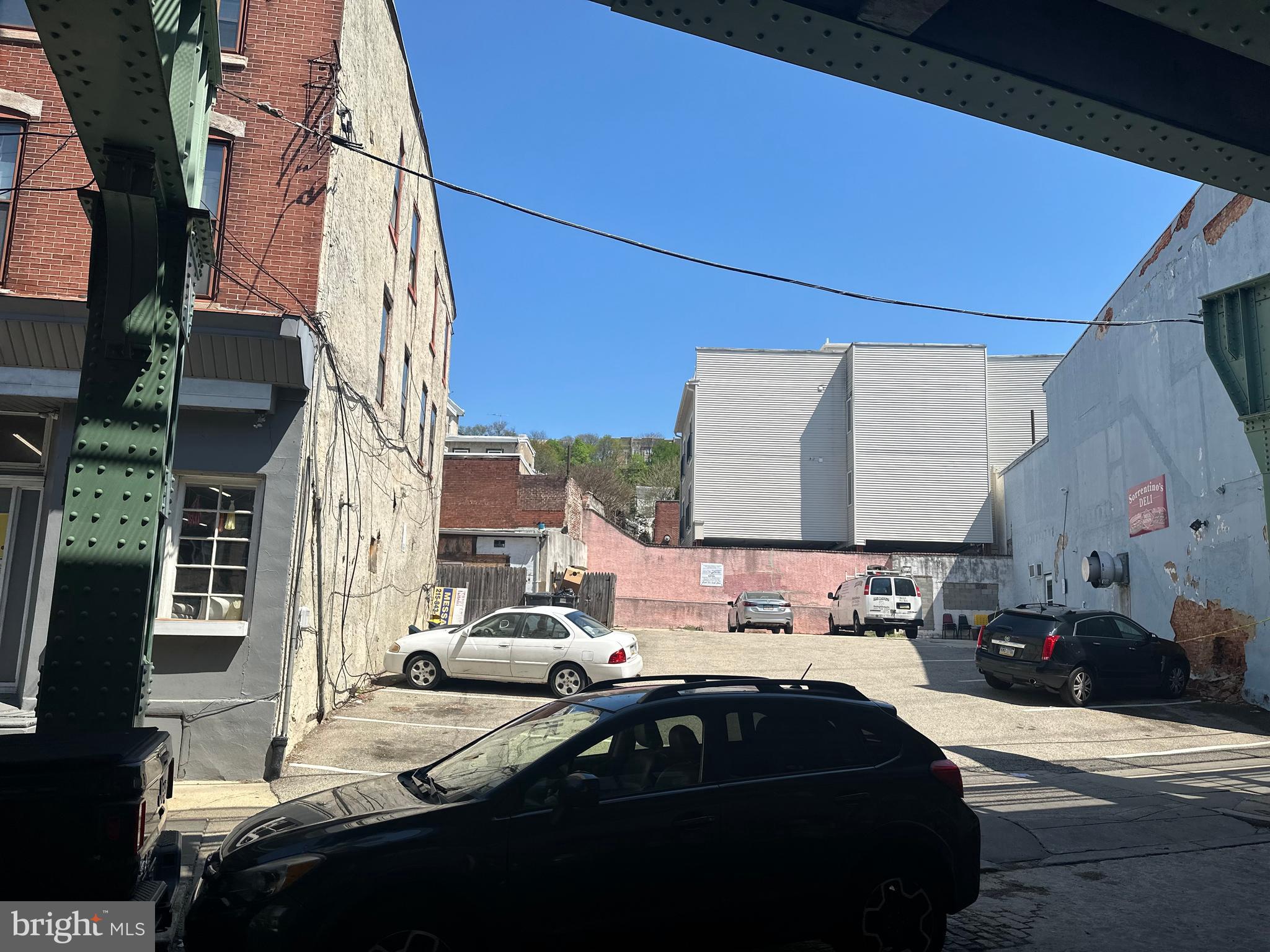 "Exceptional Investment Opportunity in Historic Manayunk: Capitalize on a comprehensive property package valued at $3,200,000, located in the vibrant district of Manayunk, Philadelphia. The package includes:
4365-67 Cresson St.: Two apartment buildings with six residential units (two 2-bedroom, three 1-bedroom, and one efficiency), offered at $1.6 million, generating a rental income of $10,000 monthly.
4363 Cresson St.: A 12-space private parking lot, with 4 spaces currently leased at $150 each, offered at $900,000.
4361 Cresson St.: A mixed-use, three-story corner building with Old European charm and a ground-floor restaurant/deli. The family business will close upon sale, opening new possibilities for the next owner. This property is offered at $700,000, with upper floors ready for renovation into additional residential or commercial spaces.
Situated steps from public transportation and the local train station, these properties are nestled in a National Historic District known for its scenic charm and urban convenience. Over 50 chic boutiques and 30 diverse restaurants make Manayunk a picturesque and coveted investment destination. Ideal for savvy investors seeking to expand their portfolio in a community with significant growth potential."