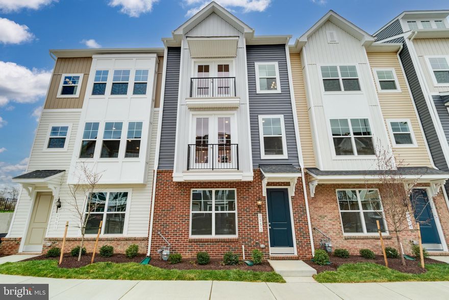 Ready for IMMEDIATE occupancy, 2553 Hopton Lane is a BRAND NEW charming three-story townhome nestled in a quiet neighborhood with plenty of restaurants and shopping within walking distance! 

The lower level features a bedroom or office with a full bathroom upon entry from the large 2-car garage.  The main level boasts an open floor plan with plenty of natural light, creating a bright and airy atmosphere. The gourmet kitchen is a chef's dream, with modern SS appliances, large center island and stylish cabinetry. It's the perfect place to prepare meals and entertain guests. Adjacent to the kitchen are a large living room and cozy dining area, perfect for enjoying meals with family and friends.

Upstairs, on the 3rd level, you'll find the spacious master bedroom, complete with a walk-in closet and in-suite bathroom. Two additional bedrooms and another full bathroom provide plenty of space for a growing family or guests. Washer and Dryer are located on the master bedroom level.

2553 Hopton Lane is more than just a house; it's a place to call home. With its charming exterior, inviting interior, and peaceful surroundings, it offers the perfect blend of comfort and style.
Lawn care maintained by HOA. 
Location: Location close to commuter routes, shopping and downtown Frederick